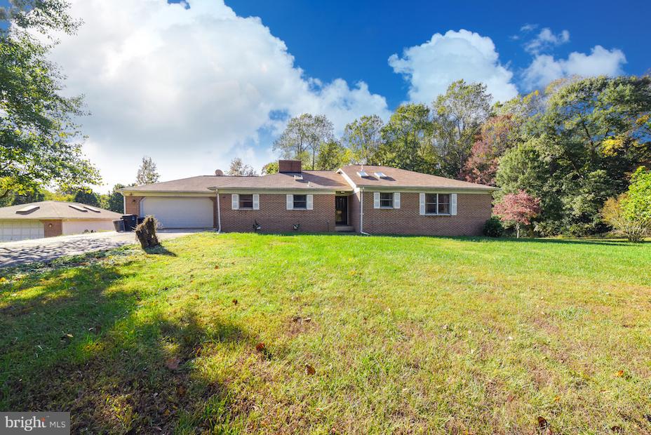 Location Location Location! 3800 sq ft all brick rambler situated on 3+ acres...w/ tons of potential! Great layout and fantastic room sizes. Finished basement, walk out lvl w/additional unfinished area (with exterior entrance) perfect for add't storage or workshop. Tiki bar & pool perfect for entertaining. 2 car attached & 4 car detached garage. Level usable lot.. Hurry, this one won't last long!