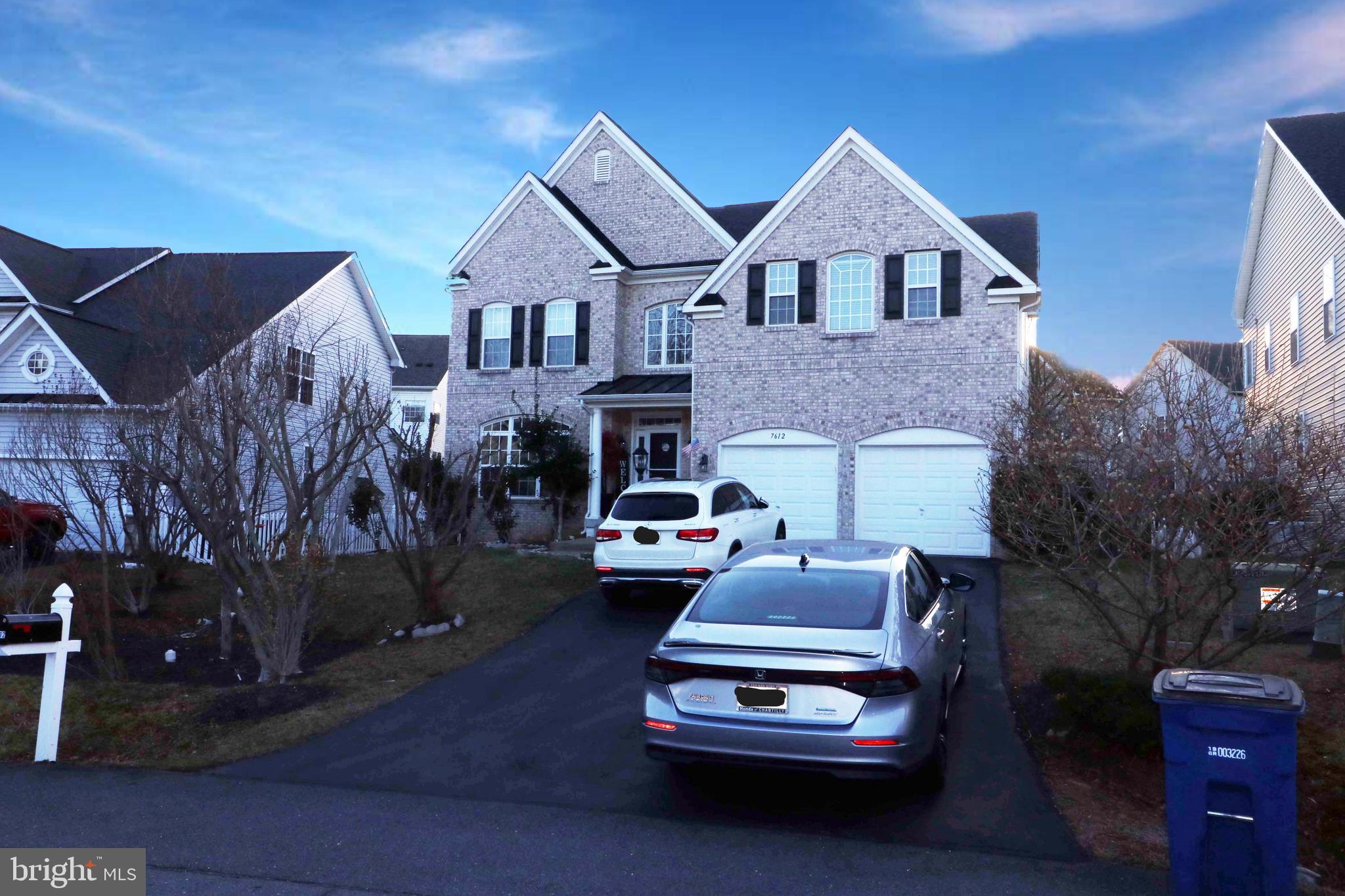 Beautifully maintained home on a cul-de-sac street. The main level boasts a two-story foyer with hardwood floors, spacious formal living and dining rooms, and a bright kitchen featuring granite countertops, white cabinets, stainless steel appliances, cooktop with vent hood, custom backsplash, and a walk-in pantry. The kitchen opens to a spacious family room with cozy fireplace, and a main-level study that overlooks the serene backyard. Four generously sized bedrooms. The luxurious primary suite includes a large walk-in closet and an ensuite bath with custom tile, two vanities, a soaking tub, and frameless shower. The finished basement offers exceptional additional living space with a large rec room, exercise room, wet bar with fridge, and a fifth bedroom with a full bath—perfect for guests or an in-law suite. Community amenities include a pool and two playgrounds. Conveniently located near shopping, dining, top-rated schools, and major transportation routes. This home combines elegance, comfort, and convenience.