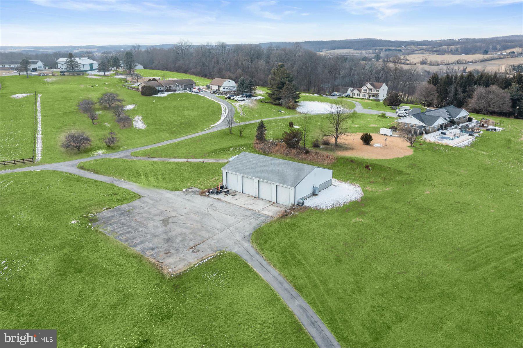 A rare and outstanding opportunity to own a 4.5+ acre C-3 zoned commercial property located just off Hanover Pike. This premier parcel boasts one of the most flexible and sought-after zoning classifications available, making it an ideal site for a wide variety of commercial developments. Investors, developers, and business owners will appreciate the site’s adaptability, strategic location, and long-term potential.

Permitted uses under C-3 zoning include Assisted Living Facilities, retail strip centers, big box or medium box stores, automotive businesses, medical offices, and many other commercial enterprises. The expansive lot provides ample space for future construction, parking, and expansion, making it a highly attractive development opportunity.

The property currently includes an existing building with four operational auto bays, one of which features a professional paint booth. This makes the site immediately usable for automotive businesses or provides interim revenue potential while plans for future redevelopment are underway. With its combination of prime location, top-tier zoning, and existing infrastructure, this property is truly a standout opportunity in the commercial market.