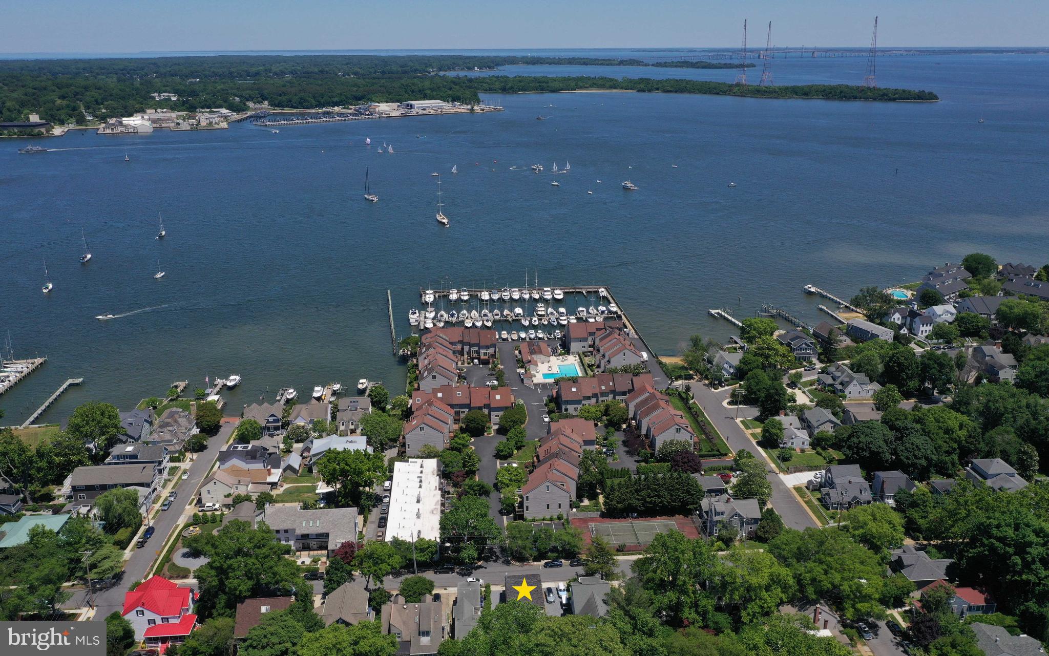 Welcome to Eastport—just steps from downtown Annapolis. This charming duplex with rare two-car off-street parking offers the perfect blend of convenience, and coastal living. Freshly painted throughout, this meticulously maintained two-bedroom, 1.5-bath home features numerous updates, including new hardwood flooring throughout, new windows in the living room and kitchen, a new wood-burning stove, and a new A/C heat pump—making it move in ready. A generous deep lot offers excellent potential for future rear additions and expanded living space providing the opportunity to truly make this home your own. Whether you're looking for a full-time residence or the perfect weekend getaway, this Eastport gem has it all. Ideally located near the waterfront, you’ll enjoy easy walking access to marinas, top-rated restaurants, pubs, swim clubs, sailing clubs, and boutique shopping. Don't miss this turnkey offering in a prime location.