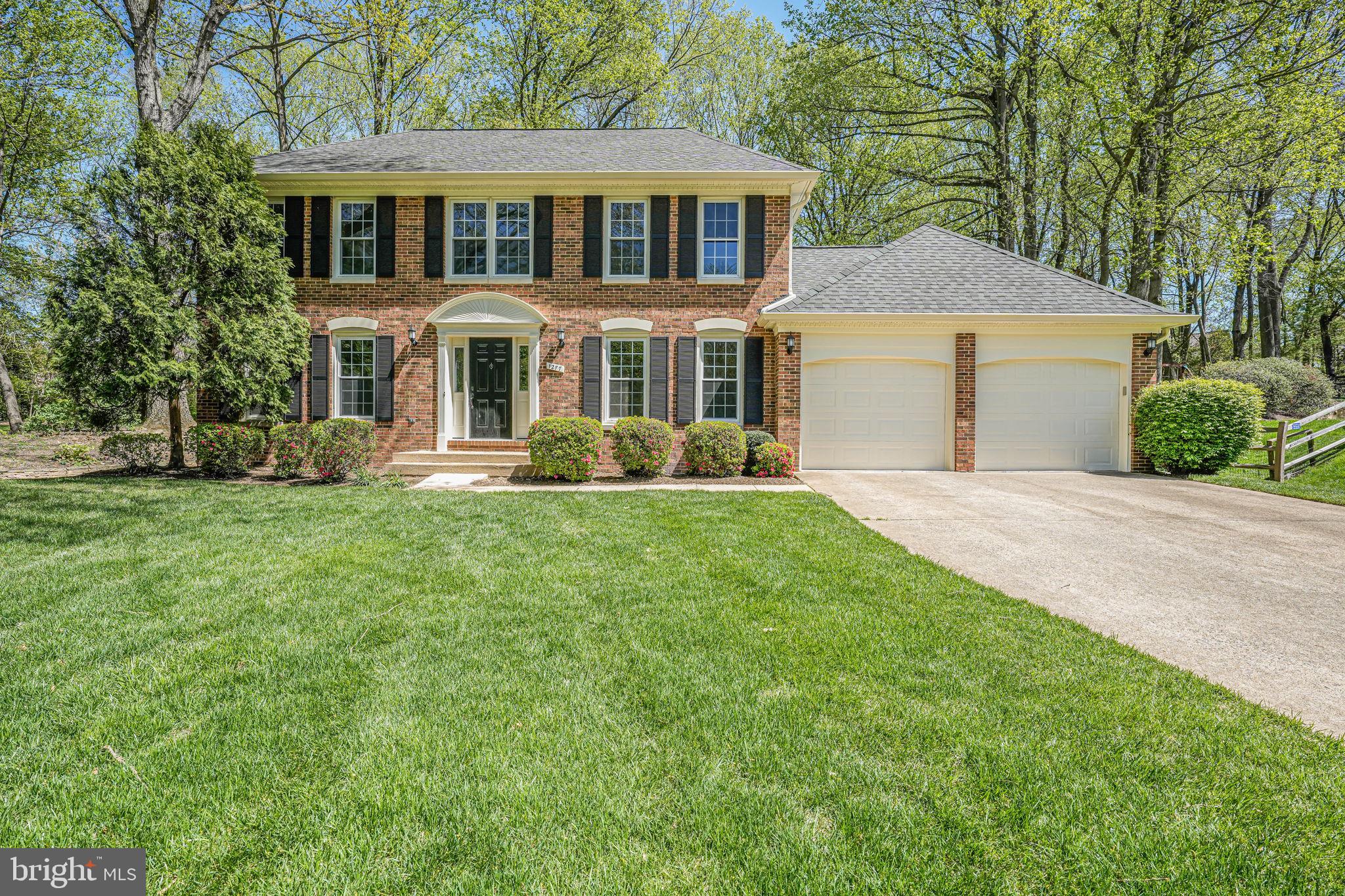Classically stunning curb appeal, this mixed brick colonial in North Reston sits at the end of a cherry blossom lined cul-de-sac with mature and magnificent trees, beautifully landscaped and private. Completely renovated, every surface and fixture is new and luxuriously appointed.  Enter into the foyer with subtly elegant lighting and wide-plank engineered hardwood flooring throughout the main level. The artfully expanded kitchen with all new custom cabinetry, a wall of additional pantry cabinets and designer hardware is crowned by gorgeous quartz counters & Zellige Perla tile backsplash. All new stainless steel appliances and brand new washer & dryer just off the kitchen are perfectly placed with easy laundry chute capability. Wood burning fireplace and beautiful, gentle flow of the main level affords versatile living space for all of your family needs. New door hardware, outlets, switches and light fixtures throughout give this Reston classic a new construction feel. Freshly painted with new carpeting upstairs, this gorgeous brick colonial on almost 1/2 acre of privacy has it all!  Primary suite completely custom renovated with huge walk in closet, recessed lighting and an exceptional & elegantly appointed primary bathroom. Standalone soaking tub and oversized walk in shower, quartz countertops and specialty hardware.  3 additional  bedrooms upstairs are generously sized with a secondary full bathroom, newly renovated.  
Lower level basement is ripe for expansion with bathroom plumbing rough-in and walk out rear staircase. Plenty of room for additional recreation or bedroom space, au pair suite or bar and media room additions. New Roof installed 2017 with gutter guards 2017, and attic freshly insulated 2024. New HVAC & thermostat 2023 and brand new front door and shutters 2019.
0.8 miles to Rte 7 straight into Tysons,  less than 4 miles to 3 metro stops and 8 minutes to Reston Town Center with a vast array of restaurants, shopping and entertainment! You can’t beat this exclusive North Reston location with one of the largest and most private cul-de-sac lots in the neighborhood.  Kids riding bikes and neighborhood gatherings with cocktails and 4th of July fireworks are the epitome of great American living! Reston pools, walking/bike trails, community center, parks and playgrounds and endless outdoor adventuring are part of the Reston way of life!