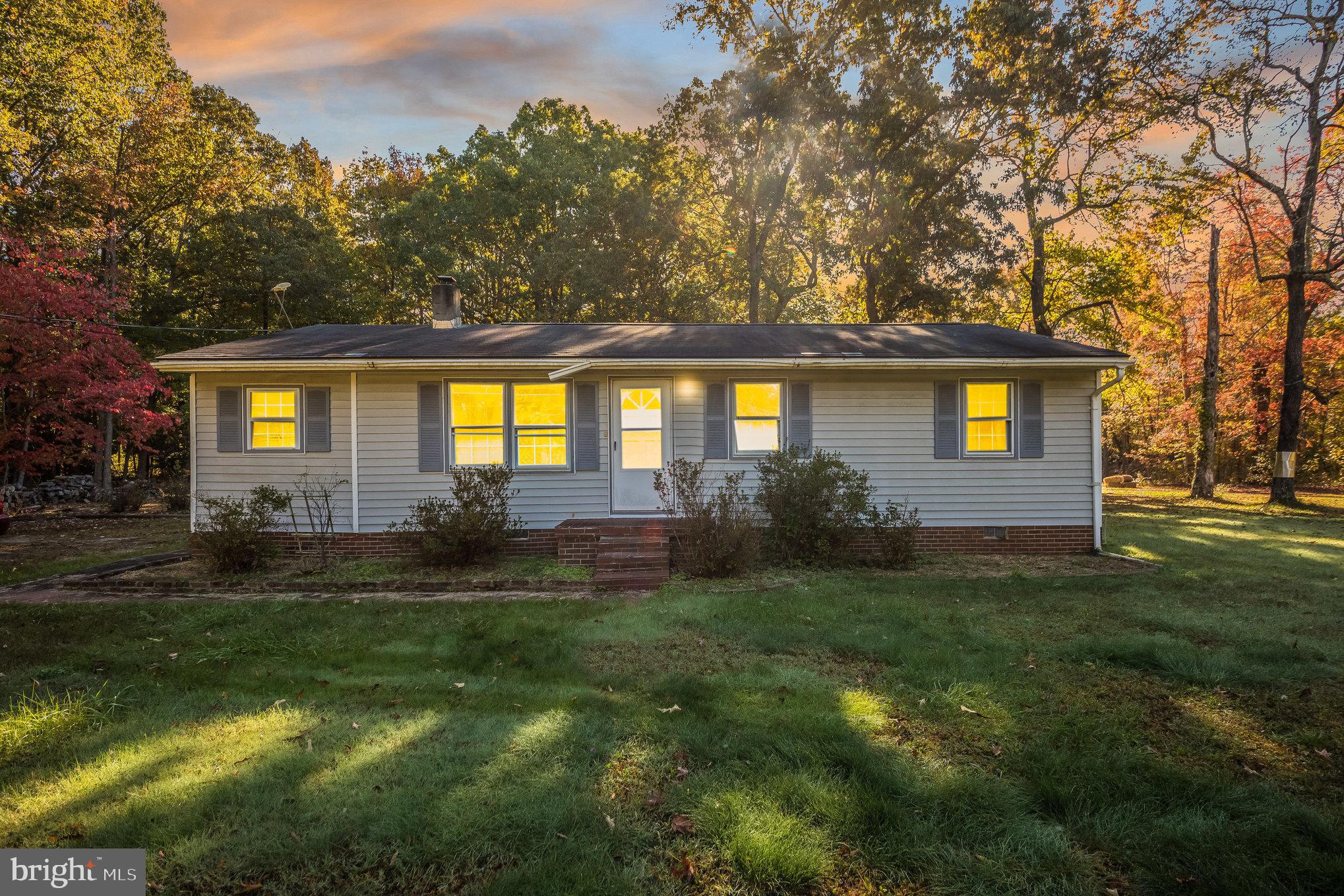 Calling all CASH investors! Priced below appraised value! Great opportunity to own a wonderful piece of property to call home!  Beautiful level lot with a cute rambler set back off the road.  Just under 1.5 acres with no HOA.  This home has a lot of awesome qualities including a Generac already built in. If you prefer gas cooking the line is already there - just switch out to your gas appliance.  Make it your own! The garage/outbuilding has electric and work spaces, so bring your hobbies. There's already a garden so the soil is prepped and ready for spring.  Just a little elbow grease, some septic  and other repairs, and you can move in.  Close to NSF-Dahlgren, shopping, restaurants, 301 bridge.  Schedule your showing and find out what other perks  this property holds.