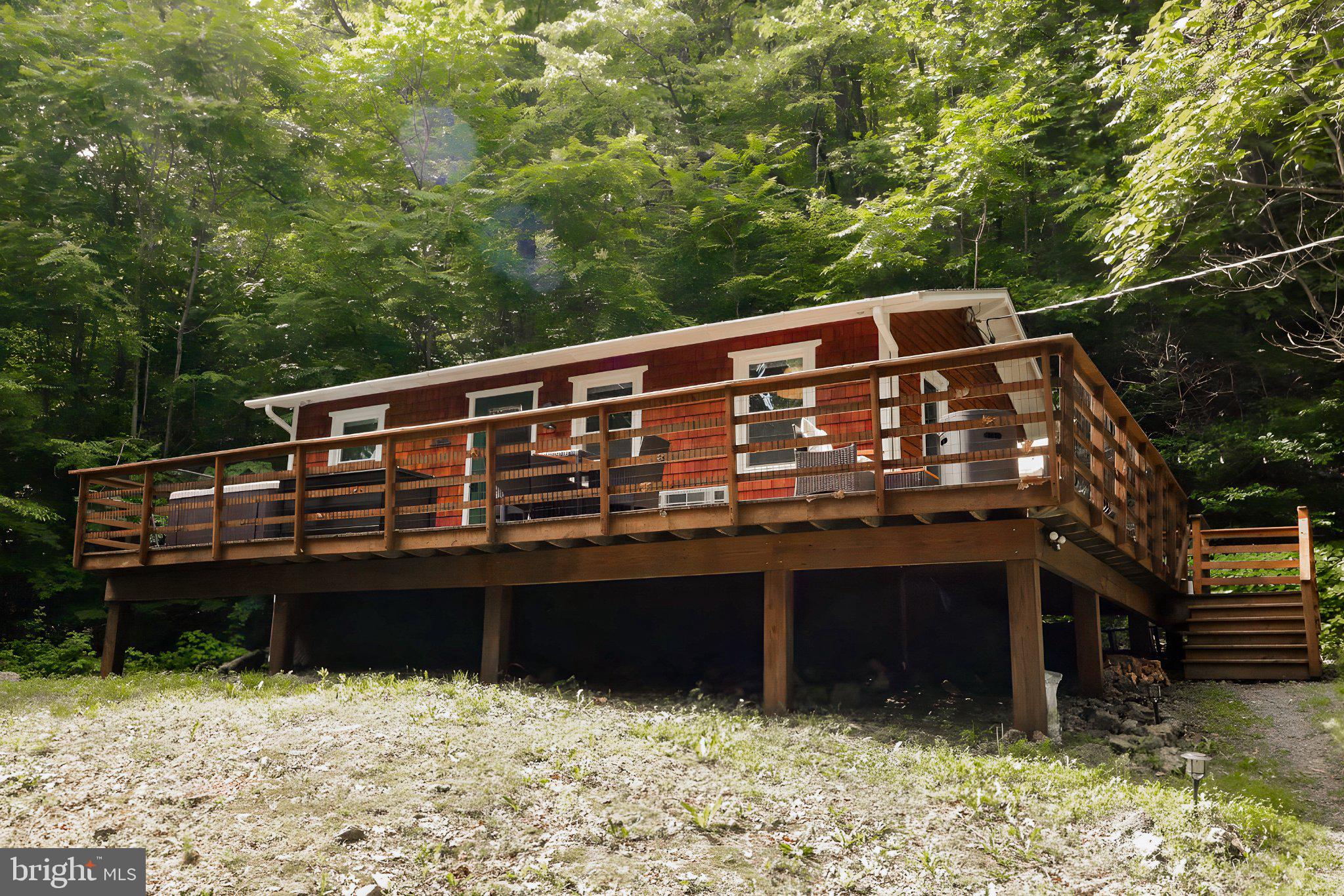 Tucked away on 6.29 private acres in the foothills of the Blue Ridge Mountains, this fully renovated and professionally furnished cabin offers a rare opportunity to own a turnkey retreat with proven short-term rental potential. This 1-bedroom, 1-bath home has been thoughtfully updated throughout, featuring a completely remodeled kitchen, new windows, updated lighting, fresh interior paint, and a stylish bathroom with a new vanity and fixtures. The home blends modern finishes with warm, rustic character, creating an inviting and comfortable space for guests or personal use. Recent improvements also include a newer roof, updated electrical outlets and switches, high-speed internet capability, smart lock entry, and new exterior lighting. The property has been fully furnished, allowing for a seamless transition for the next owner.
Outside, enjoy a private setting with over 6 acres of wooded land, enhanced by a firepit area and selective tree clearing to open up usable space while maintaining privacy. Whether you're relaxing under the stars or hosting guests, the outdoor setting adds to the property's appeal as a getaway destination.
Currently positioned as a short-term rental, the property has generated approximately $46,000 annually, offering an attractive option for investors seeking income-producing real estate, a weekend retreat, or a combination of both.
Conveniently located within reach of Shenandoah National Park, hiking trails, wineries, and other popular destinations, this property provides both seclusion and accessibility.
Offered fully furnished and ready for immediate use.