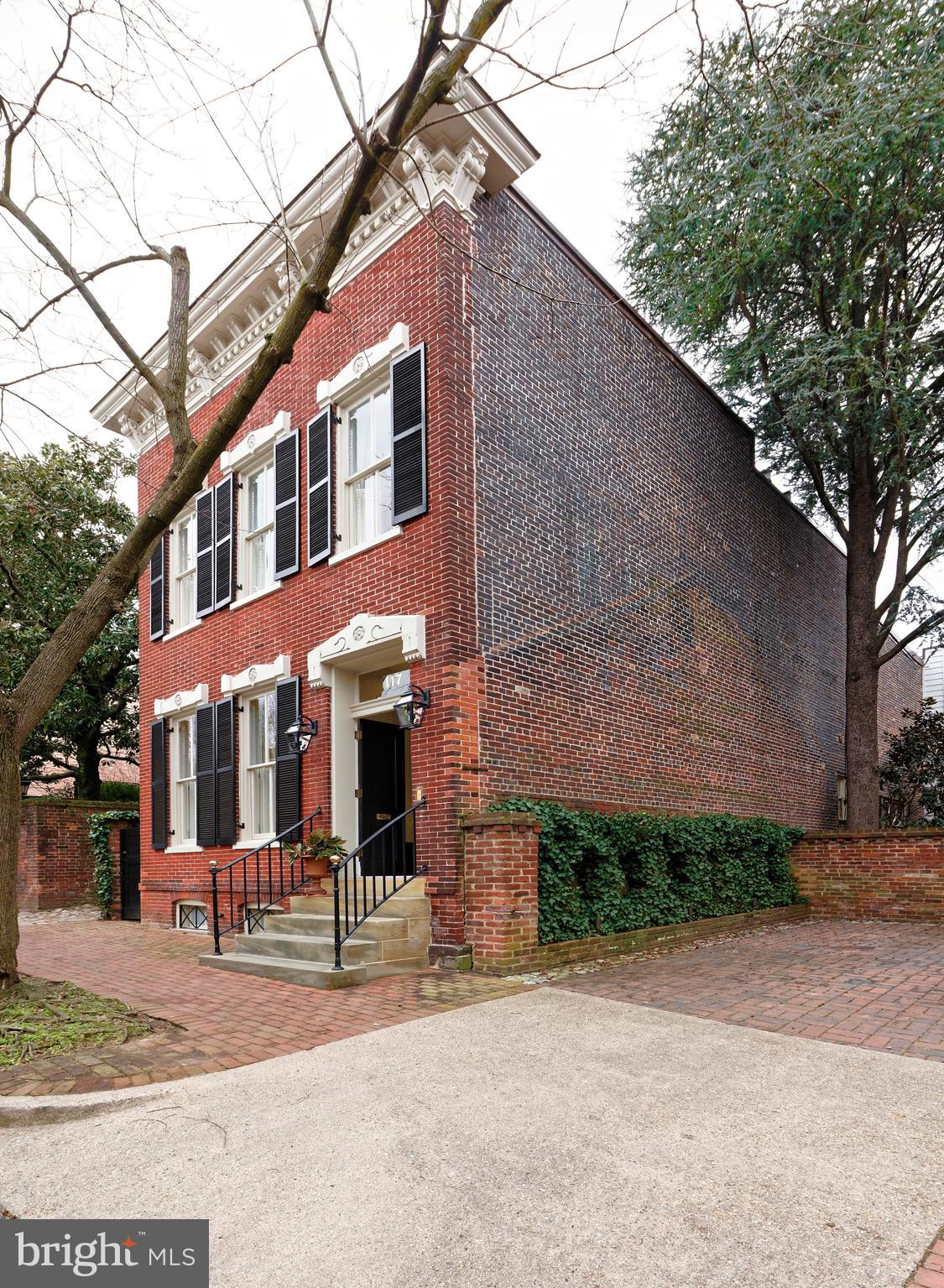 Impeccable renovation of this historic house with original floors, doors and door casings,   Large chef's kitchen with premium appointments and appliances with adjoining family room.  Expansive private patio surrounded by brick walls and mature plantings.  2 car off street parking.  ENTERED FOR COMP PURPOSES.
