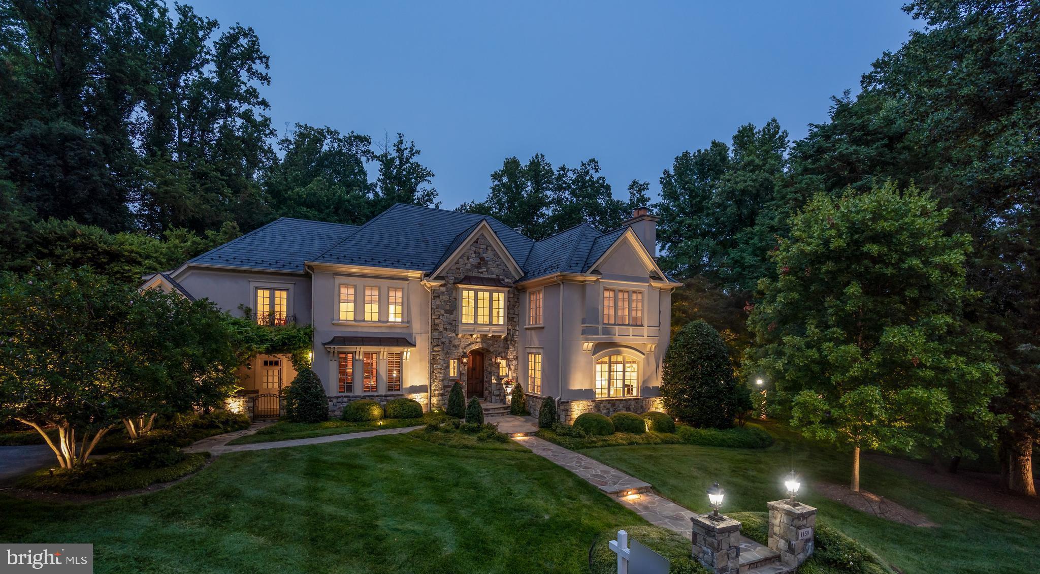 Award Winning Property in Sought After Neighborhood of Woodlea Mill.  Stone and Stucco Home with Slate Roof combines Timeless Style, Ageless Bespoke Craftsmanship and Modern Floor Plan that flows easily between Beautiful Outdoor Living on Premium Lot and Gracious Interiors. Natural Gas Lanterns welcome you into Spacious Foyer from which all Main Level Rooms radiate.  Stunning Paneled Library features separate Courtyard entrance though French Door and Custom Bookcase.  Living Room contains one of Five Masonry Fireplaces with gas inserts found in the home and connects through Cased Openings and polished Inlaid Wood Floors to Formal Dining.  Well Designed Kitchen and Keeping Room craved by Buyers are surrounded by light filled windows and open into a Family Room anchored by an Oversized Stone Fireplace with Two Story Views of Outdoor Living Area by Surrounds Landscape Architecture Featured on the Cover of Home & Design and Awarded the Outdoor Living Area Grand Award.  This Magical Space is comprised of a 20x40 Saltwater Pool and Spa with Natural Boulder Design, Fully Equipped Outdoor Kitchen and Stone Fireplace beneath Maintenance Free Pergola, Extensive Professional Landscaping and Hardscaping plus a Wonderful Level Lawn for Parties or Play.  Well Designed Back Area of Home includes a 2nd Office, Pantry and Well Designed Mudroom/Laundry with Full Bath easily accessed by Pool Users.  Tranquil Master Suite contains Sitting Area with Fireplace, Bath featuring Double Vanities and Walk-in Shower and a Huge Room Size Closet with Built-ins.  Three Additional Ensuite Bedrooms with Walk-in Closets complete the Upper Level.  Iconic Stone Grotto Wine Tasting Room with 500+ Bottle Wine Cellar set the tone for a Lower Level focused on Entertaining.  A Texan Custom Built Wood Bar and Bookcase with Crafted Ironwork Detailing centers the Great Room.  Ensuite Guest Suite, Exercise Room with Steam Shower Bath, Theatre Area and Playroom are included here.