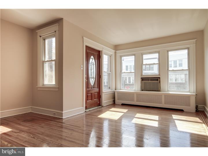 Beautifully renovated home in the Mayfair section of the Northeast. Refinished hardwood floors throughout the bright and spacious living room and dining area. Newly placed tile in the kitchen that leads out to the sizable back deck. The hardwood floor continues up the staircase and meets new carpeting in all three bedrooms. There is fresh paint throughout the home with updated ceiling fixtures, as well as new lighting for the front entryway. THe home has convenient garage access with a brand new insulated garage door. Full basement with concrete floors and washer dryer units.