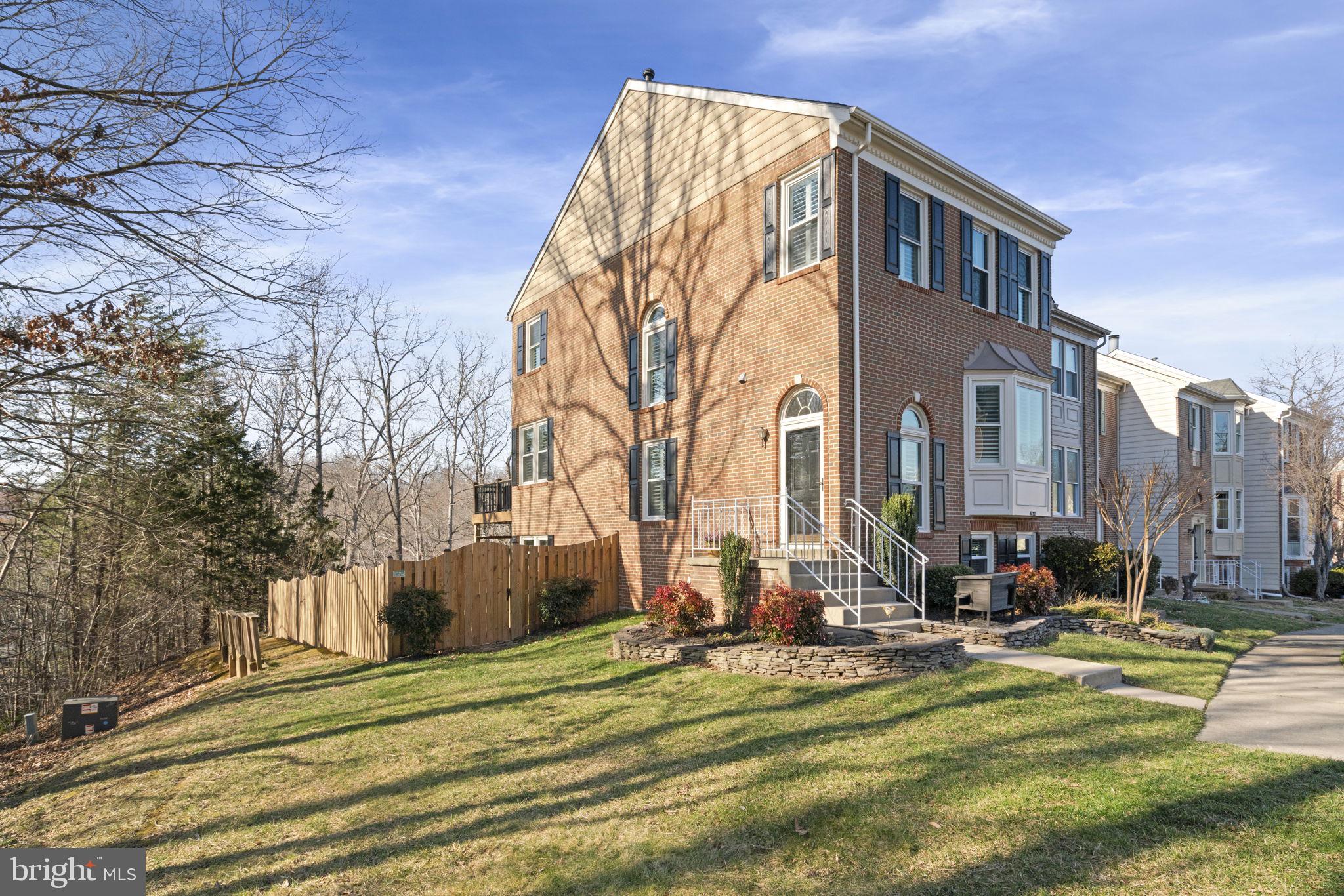 This SPECTACULAR END UNIT townhome in sought after Westridge  is situated on a premium lot with trees along side and back.  This Spacious  4 bedroom, 3.5 bath home boasts with  custom renovations throughout.  Long-term owners for the last 26 years have truly loved this home and it shows in the design choices.  Recent renovations include new roof, windows, interior shutters, open-concept owners  bath with heated flooring and towel rack. Kitchen with quartz countertop, upgraded  stainless steel Whirlpool appliances leading out to a large maintenance free Trex deck. Hardwood floors on main level  with  custom stone double sided gas  fireplace make this a MUST SEE!  If you are looking for a man cave…wait until you see the basement!  Custom brickwork, wood-burning fireplace and high-end vinyl plank flooring. Walk out to enclosed fence yard++MORE!   This one won’t last long . Some furnishings can convey.  Ask for Details   (Please wear booties provided)  Thank you
