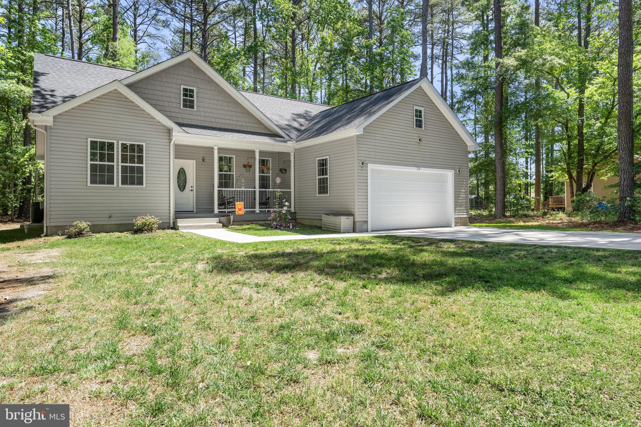 Move right into this beautifully maintained 2022 home offering the perfect combination of modern comfort, one-level living, and resort-style community amenities. With 3 bedrooms, 2 baths, and an attached 2-car garage, this home is designed for easy everyday living and entertaining. The bright, open-concept floor plan seamlessly connects the living room, dining area, and kitchen. The kitchen features granite countertops, a stylish tile backsplash, light gray cabinetry, a center island, and plenty of workspace for cooking and gathering with family and friends.The private primary suite is thoughtfully separated from the guest bedrooms and offers two walk-in closets, a tray ceiling, recessed lighting, and a spacious ensuite bath with dual vanities, a private water closet, and a luxurious digital temperature-controlled shower. Two additional bedrooms and a full bath provide comfortable space for guests, family, or a home office. Additional highlights include a conditioned crawlspace, generous storage, attic access, a covered front porch, rear deck, and attached 2-car garage. Located in the sought-after Glebe Harbor/Cabin Point community, you'll enjoy exceptional amenities including a community pool, clubhouse, tennis courts, playground, picnic pavilion, boat ramps, sandy beaches, and access to the Potomac River. Whether you're looking for a full-time residence, a retirement home, or a weekend getaway, this property offers the lifestyle you've been searching for. Annual community amenities fee is just $245 and is billed with property taxes.