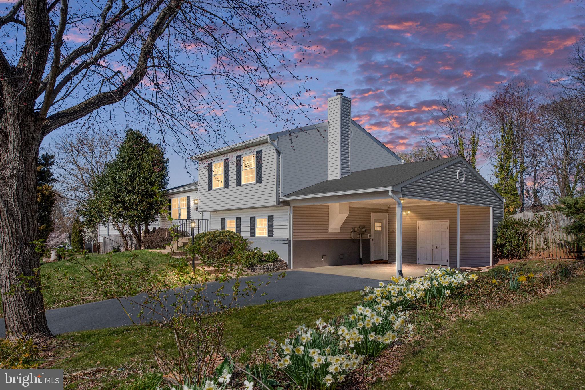 ***Multiple Offers Received - Offers Due by Tuesday 4/1 at 5PM*** This well-maintained 4-level split home offers plenty of space and great features, including a 2-car carport, a 4-season room, a tiered deck, and a large, fully fenced backyard. The inviting foyer includes a convenient coat closet and leads into the spacious living room. An arched doorway opens to the dining room, which has sliding glass doors leading to the bright 4-season room, surrounded by windows. The kitchen boasts an efficient layout with a breakfast bar, ample counter space, and easy access to the dining room.

Upstairs, you'll find the primary suite, complete with its own private bathroom and a glass door leading to the tiered rear deck. Two additional generously sized bedrooms, another full bathroom, and a linen closet complete this level. The lower level features a large recreation room with a fireplace, a recently updated full bathroom with a wheelchair-accessible shower, the laundry area, and access to the carport with storage space.

The lowest level offers a great bonus family room/rec room/playroom with new paint, carpet and recessed lighting, plus a 4th bedroom/den (not to code) also with new paint, carpet and recessed lighting. This home is ideal for comfortable living and entertaining!

The Hubspace smart home system with 2 switches and 4 night owl 4K hardwired security cameras will convey.