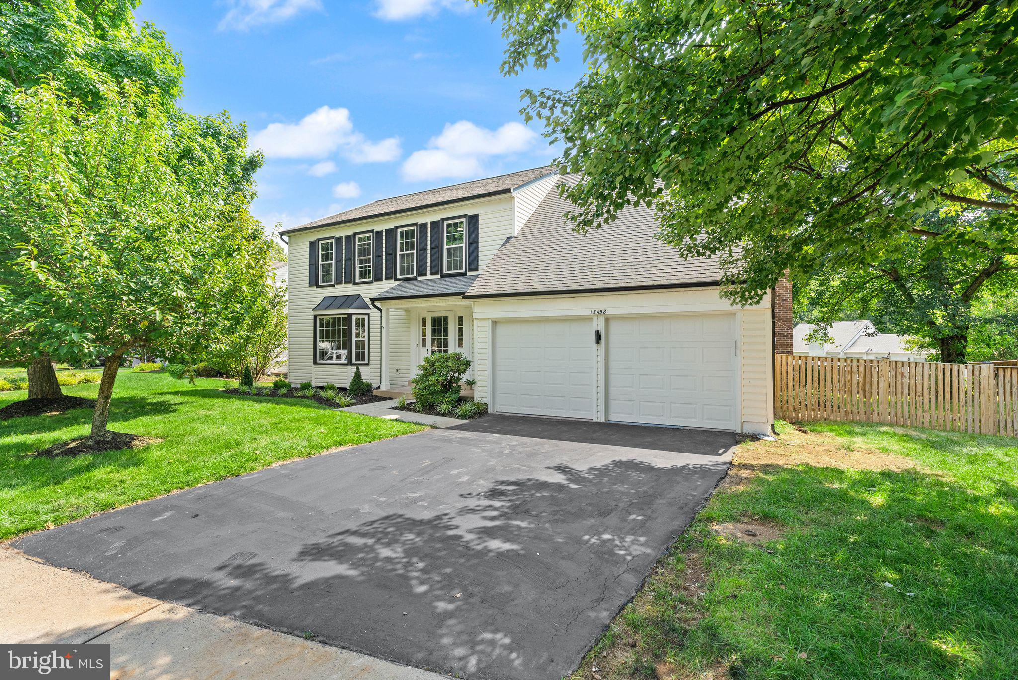 Welcome to this beautifully remodeled home in one of Chantilly's most desirable communities, where modern design meets quality craftsmanship. Thoughtfully renovated from top to bottom with high-end finishes, this move-in-ready home features a new HVAC (2024) and a brand-new roof (2026) for added peace of mind. The main level offers a bright and functional layout with spacious living and dining areas, a cozy family room, powder room, and a stunning gourmet kitchen showcasing quartz countertops, a waterfall island, custom cabinetry, designer backsplash, and stainless steel appliances. Upstairs, you'll find four generously sized bedrooms and two fully remodeled bathrooms, including a luxurious primary suite with elegant porcelain tile, custom vanities, and upscale finishes. The finished lower level provides exceptional additional living space with a large recreation room, den, full bathroom, laundry area, and an oversized utility/storage room. Ideally situated just minutes from premier shopping, dining, parks, and major commuter routes, this home offers the perfect combination of luxury, comfort, and convenience. Don't miss this exceptional opportunity to own a truly turnkey home in the heart of Chantilly.