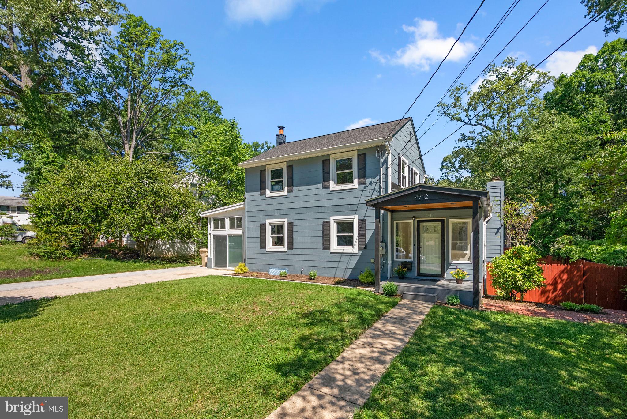 Welcome to a beautifully updated 3-bedroom, 2 full bath, 1 half bath home that is truly move-in ready. Renovated throughout in 2022, this home offers the comfort, function, and flexibility today’s buyers are looking for, all with no HOA. From the moment you enter, you’ll notice thoughtful updates, inviting living spaces, and a layout that gives you room to gather, relax, work, and unwind.
The main level offers several distinct spaces that make daily living easy. The formal living room provides a bright and welcoming area near the front of the home, while the family room addition adds extra space and features a fireplace that brings warmth and character to the room. The kitchen is designed for both style and function, with granite counters, stainless steel appliances, an eat-in area, and plenty of cabinet space for storage. Just off the kitchen, doors lead to an oversized deck, creating a smooth flow for outdoor dining, morning coffee, or evening relaxation.
A 4-season room adds even more usable space and can serve many needs, whether used as a sitting room, hobby area, office, reading space, or flex room. A convenient half bathroom completes the main level.
Upstairs, hardwood flooring runs throughout the upper level, adding a clean and timeless look. This level includes three bedrooms and a renovated full bathroom, offering a fresh and comfortable setting. The finished lower level expands the home even further with a large recreation area, a full bathroom, and a den that may work well as a guest space, office, fitness area, or possible 4th bedroom depending on your needs.
Important work has already been completed, including a new roof and electrical heavy-up with rewiring of the main and upper levels. The home is also served by two HVAC units. The location is also a standout, only 5 minutes to the University of Maryland & Greenbelt Metro. I-495, I-95 & Route 1 are also super close. Minutes to shopping, restaurants, grocery stores, and Costco. This updated home offers space, convenience, and flexibility in one well-appointed package.