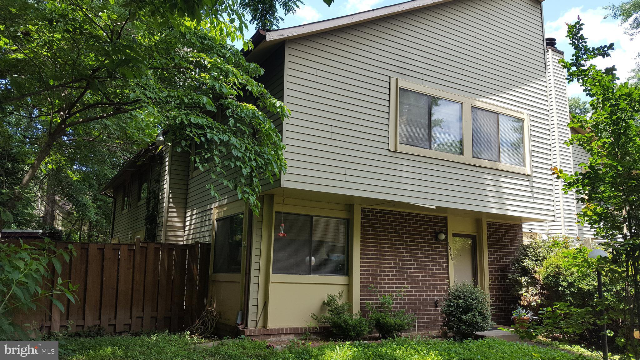Spacious End-Unit Townhome in the Heart of Burke Centre — Ranked the #1 Best Place to Live in Virginia by U.S. News & World Report! (Ask your agent for the article link available in agent notes.)
Nestled at the end of a quiet court and surrounded by trees, this large 4-bedroom, 2.5-bath end-unit townhouse offers 1,464 square feet of comfortable living in one of Northern Virginia’s most sought-after communities.
The upper level features four spacious bedrooms and two full baths, including a large owner’s suite with private en-suite bath — ideal for multi-generational living, roommates, or investors. Located less than 4 miles from George Mason University, the layout also presents excellent rental income potential.
The main level offers sunny open living spaces, hardwood floors, a cozy wood-burning fireplace with glass doors, and a fully renovated kitchen featuring granite countertops, cherry cabinetry, and full-size washer and dryer. The large dining area opens to a low-maintenance fenced rear yard with decking and storage shed — perfect for outdoor entertaining.
Enjoy the incredible lifestyle of Burke Centre with walking access to Lake Barton, scenic trails, shopping, restaurants, and community amenities. Located within the highly regarded Robinson Secondary School district.
Commuters will love the convenience of a nearby Metro bus stop with direct access to the Pentagon and Metro station, plus easy access to Route 123, Fairfax County Parkway, I-66, I-395, and I-495.
Tenant occupied. Please allow a 12-hour showing window.