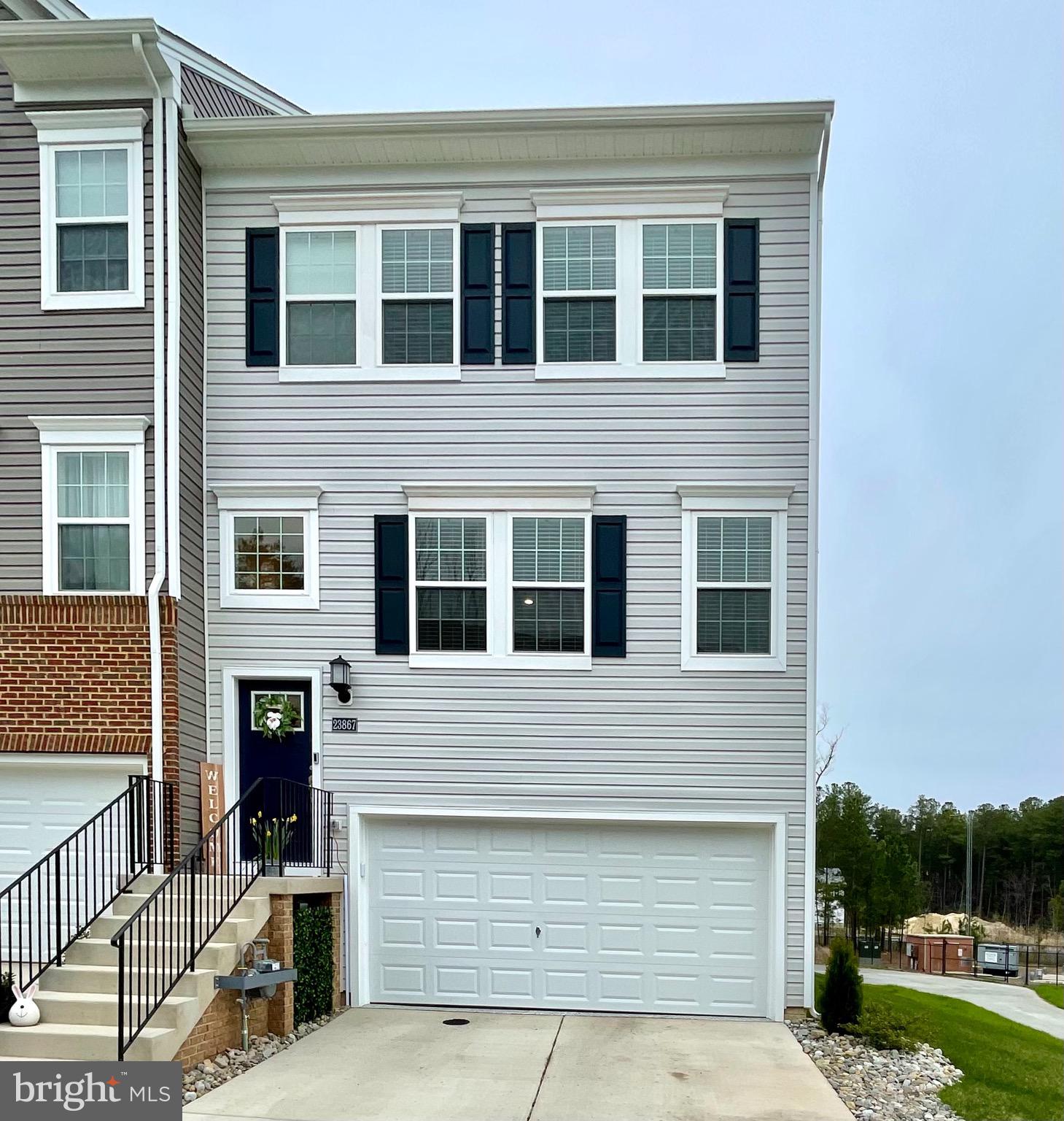 Immaculate end unit town home, less than a year old. Come imagine yourself living in this beauty featuring a massive kitchen island and open concept main level. Spacious bedrooms and beautiful master bathroom.