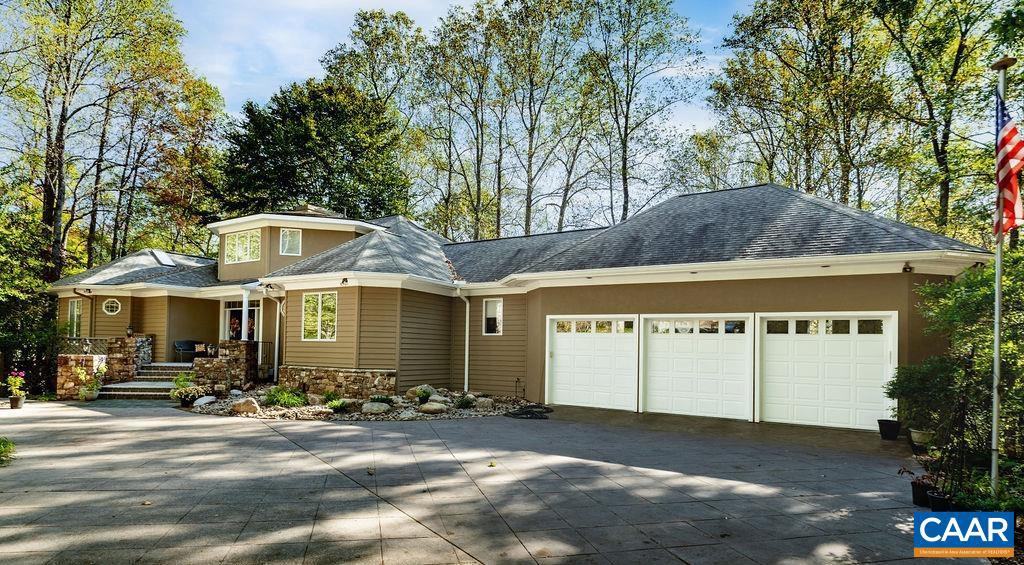 Beautifully maintained 5BR, 4BA residence set on 1.33 private acres overlooking picturesque Lost Pond in Stoney Creek. This exceptional property combines peaceful outdoor living with spacious and comfortable interiors. The professionally landscaped grounds feature mature plantings with irrigation, impressive stonework, a tranquil koi pond with adjoining slate patio, and a private dock ideal for fishing, relaxing, and enjoying the natural surroundings. The thoughtfully designed floor plan spans 2.5 levels and includes a spacious kitchen with premium appliances, a butler?s pantry, and a welcoming great room with a gas fireplace. The main-level primary suite offers a relaxing retreat with an adjoining sunroom and two walk-in closets. Upstairs, the loft area with a full bath provides flexible space for guests, hobbies, or a home office. The finished terrace level includes a large family room with wood-burning fireplace, wine bar, exercise room, and additional guest accommodations. Additional highlights include whole-house audio, central vacuum, numerous recent improvements, and an oversized 3-car garage. A truly special property in one of Stoney Creek?s most scenic waterfront locations.,Granite Counter,Painted Cabinets,White Cabinets,Fireplace in Family Room,Fireplace in Great Room