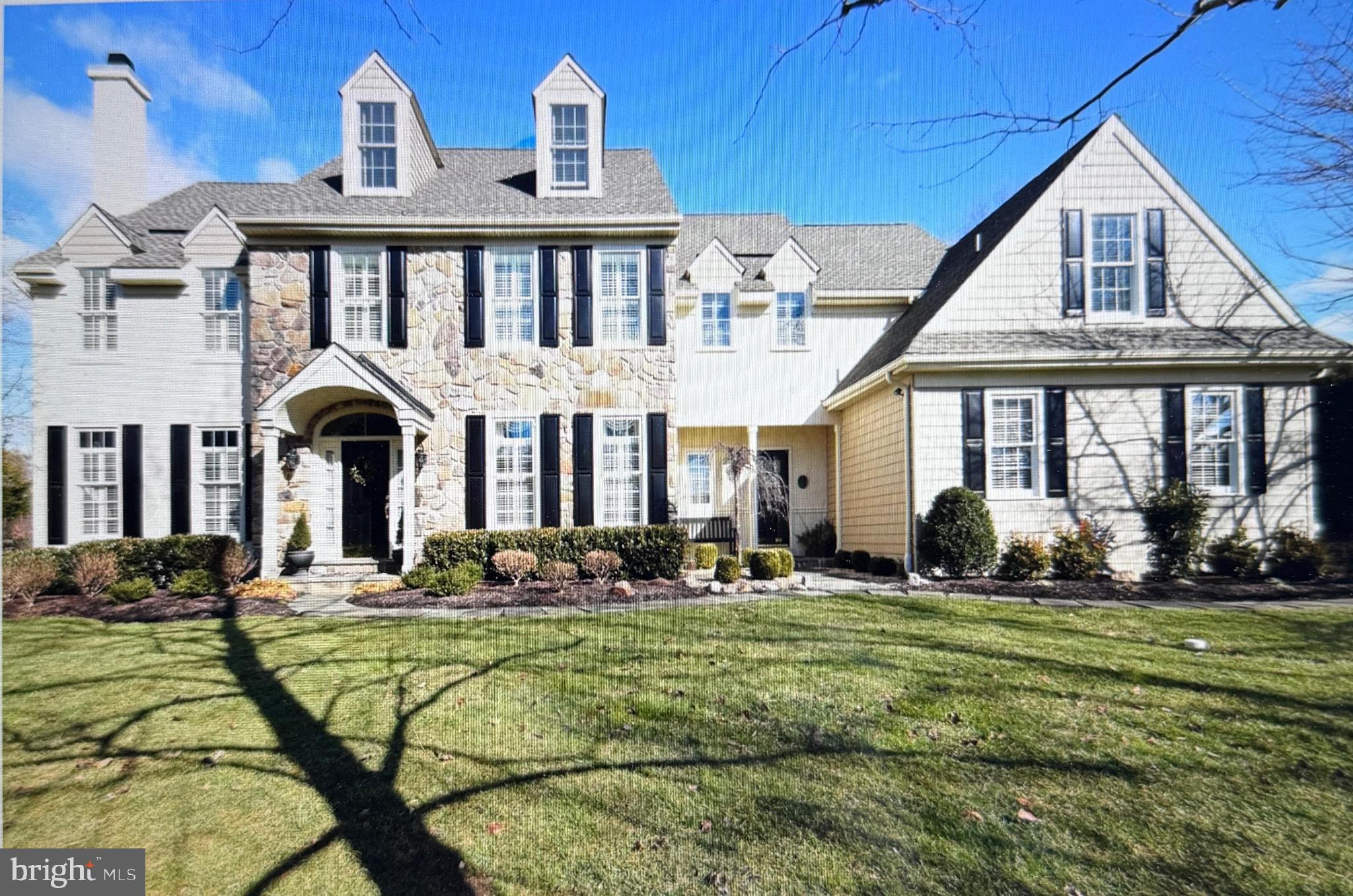 Magnificent Matthews Meadows Showcase Home – 6 Bedrooms, 5.5 Baths, Private Cul-de-Sac with in-ground Pool!  Welcome to 21 Kyle Drive, an exceptional stone-front colonial in the prestigious Matthews Meadows neighborhood of Chester Springs, located in the award-winning Owen J. Roberts School District. Nestled on a lush, professionally landscaped cul-de-sac lot, this move-in ready home offers over 6,000 finished square feet, 6 bedrooms, 5.5 baths, and countless upgrades throughout.  Step into a gracious foyer and enjoy the formal dining room, sunlit living room with wood-burning fireplace, and private office—perfect for remote work. The chef’s kitchen features tall wood cabinetry, granite countertops, stainless steel appliances, pantry, and an adjacent eat-in area opening to a stunning great room with vaulted ceilings and soaring stone wood burning fireplace. Sliding doors lead to a spacious deck overlooking the in-ground pool with waterfall, lighting, and sound system—a true entertainer’s paradise.  The expansive primary suite offers a sitting area, dual walk-in closets, and a luxurious bath with soaking tub, dual sinks, and large tiled shower. Three additional bedrooms share an updated hall bath, and a private two-room guest suite with full bath sits above the 3-car garage. The finished lower level provides endless options for recreation, media, or fitness, with access to a stone paver patio and backyard oasis 3/4+ acre lot backing to open space,.  Enjoy an unmatched lifestyle with Evans Park, biking trails, West Chester, King of Prussia, and Valley Forge nearby, plus proximity to Marsh Creek State Park and Bryn Coed Preserve. This isn’t just a home—it’s your forever retreat in the heart of Chester Springs
.