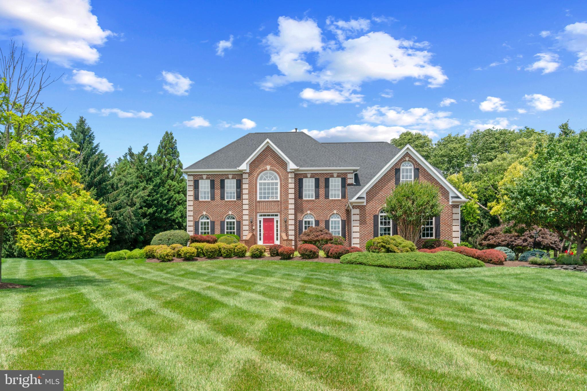 Meticulously maintained custom home in the extremely sought after Manor Oaks community now available. Gorgeous hardscape and incredible landscape package throughout. Stunning 5 bedroom, 4.5-bath home thoughtfully designed and ideally positioned on a pristine, level 1.1 acre private corner lot in Phoenix, Maryland.  Enjoy custom cabinetry with beautiful granite countertops in oversized chefs kitchen. Beautiful formal dining and living rooms with custom lighting and upgraded trim. Main level home office. Tall ceilings on all 3 levels with grand two story foyer. Loads of natural light throughout. Finished lower level that includes two additional great rooms, wet bar for entertaining, one bedroom, one full bathroom, large utility room with ample storage, and a walk out to the rear yard. Spacious 3-car oversized garage and an impressive list of recent upgrades. Additional features include a propane gas fireplace, central vacuum system, intercom system, home link security system, water purification system, water softener, brand-new screens, and a relaxing hot tub off private rear deck. This beautifully maintained property combines comfort, space, privacy, and peace of mind with high-end system updates already completed for the new owner. Major improvements completed in 2023 include a new roof and gutters, two new Carrier Infinity furnaces, two new Carrier Infinity heat pumps, a new 75-gallon Bradford White hot water heater, and a new sump pump. Close proximity to local dining, retail shopping, and ALL major highways. Schedule a private tour today!