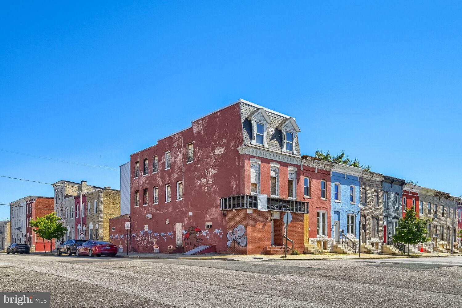 Approved 6-unit redevelopment opportunity. Estimated 3,700 sq. ft. three-level end-of-block building with approval for a 6-unit apartment building. Seller has invested over $60,000 and completed the difficult early-stage work, including full gut-out, new subfloors on the main, second, and third levels, a new roof, and new rear siding. This property was previously in shell condition — you could stand in the basement and see the sky — and it has now been stabilized and is ready for development. Seller has obtained the Mayor’s Office sign-off for the proposed 6-unit use. Approval letter and architectural drawings are available in the document section. Buyer to verify all permits, zoning, construction costs, unit count, rents, and final use. Seller estimates approximately $350,000 is needed to complete the project, with potential rents around $1,100/month per unit and an after-repair value of $700,000+. Seller previously renovated and sold a nearby 6-unit building at 615 N. Carrollton for $900,000. Act now — seller is currently waiting on permit approval and may likely choose to keep the property once permits are issued. Property is being sold strictly As-Is.