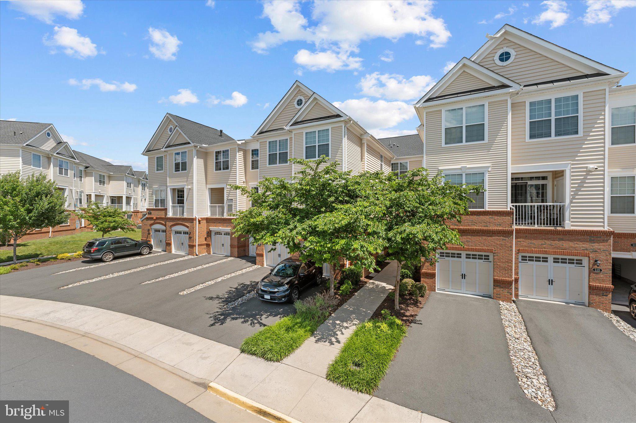 Welcome Home to effortless single-level living in the heart of Ashburn. Built in 2019 and freshly painted throughout, this beautifully maintained 2-bedroom, 2-bath condominium offers the perfect blend of modern style, comfort, and convenience. The bright, open-concept floor plan is designed for today's lifestyle, featuring granite countertops, tile and hardwood flooring, GE Profile stainless steel appliances, a gas stove with griddle, generous cabinetry, and a large center island that serves as the heart of the home. The spacious primary suite offers ample closet space and a well-appointed private bath, while the second bedroom enjoys its own full bath and large closet, making it ideal for guests, roommates, or a home office. Step outside to the quiet, semi-private covered patio overlooking the rear of the building—an inviting space for morning coffee or unwinding at the end of the day. Additional conveniences include in-unit laundry, assigned parking, and outdoor storage. Located within the highly sought-after Loudoun Valley community, residents enjoy walking access to exceptional amenities including a clubhouse, fitness center, three swimming pools, parks, playgrounds, and miles of walking trails. Just minutes from One Loudoun, Brambleton Town Center, the Silver Line Metro, Dulles International Airport, and major commuter routes, this move-in-ready home offers low-maintenance living in one of Ashburn's most desirable locations. This Home will not last!