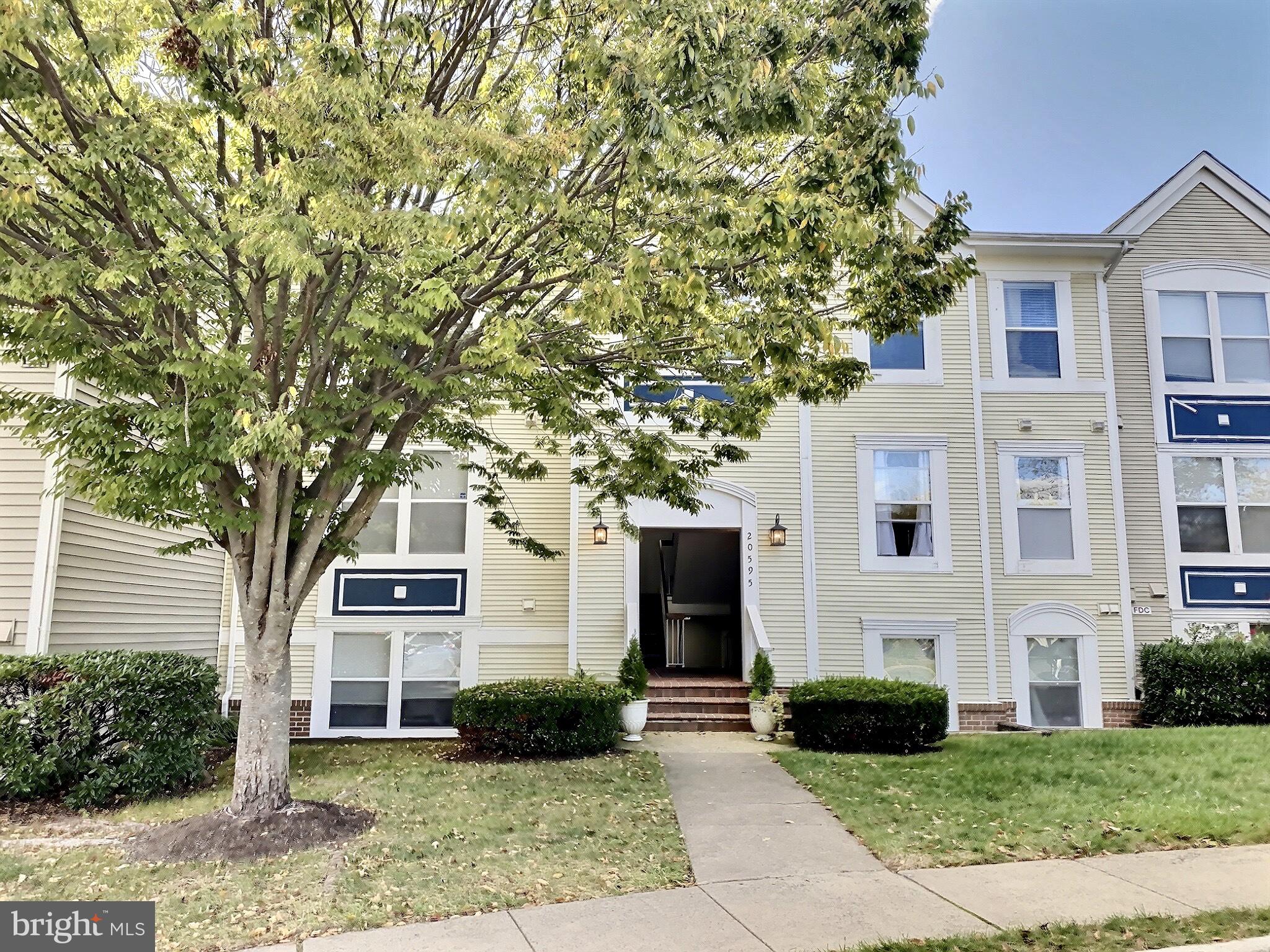 Charming two Bedroom, 1 Bathroom condo in Ashburn Village with beautiful views overlooking the community pond, fountain,  and common area!  Private, large outdoor balcony is a beautiful space to find retreat or entertain guests.  The cozy wood burning fireplace will be perfect for the upcoming Fall and Winter days.  Updated Kitchen with stainless steel appliances.  Updated Bathroom.  Access to Ashburn Village amenities including indoor and outdoor pools, tennis courts, basketball courts, lacrosse/soccer fields, volleyball sand pits, baseball fields, roller hockey rink, playgrounds, walking/jogging trails, eight community ponds stocked with bass, sun perch and carp for "catch and release" fishing.  Amazing location - close to Dulles Airport, Routes 28, 7, Dulles Toll Road, shopping, restaurants, schools and more plus membership to Ashburn Sports Pavilion available with small monthly fee.