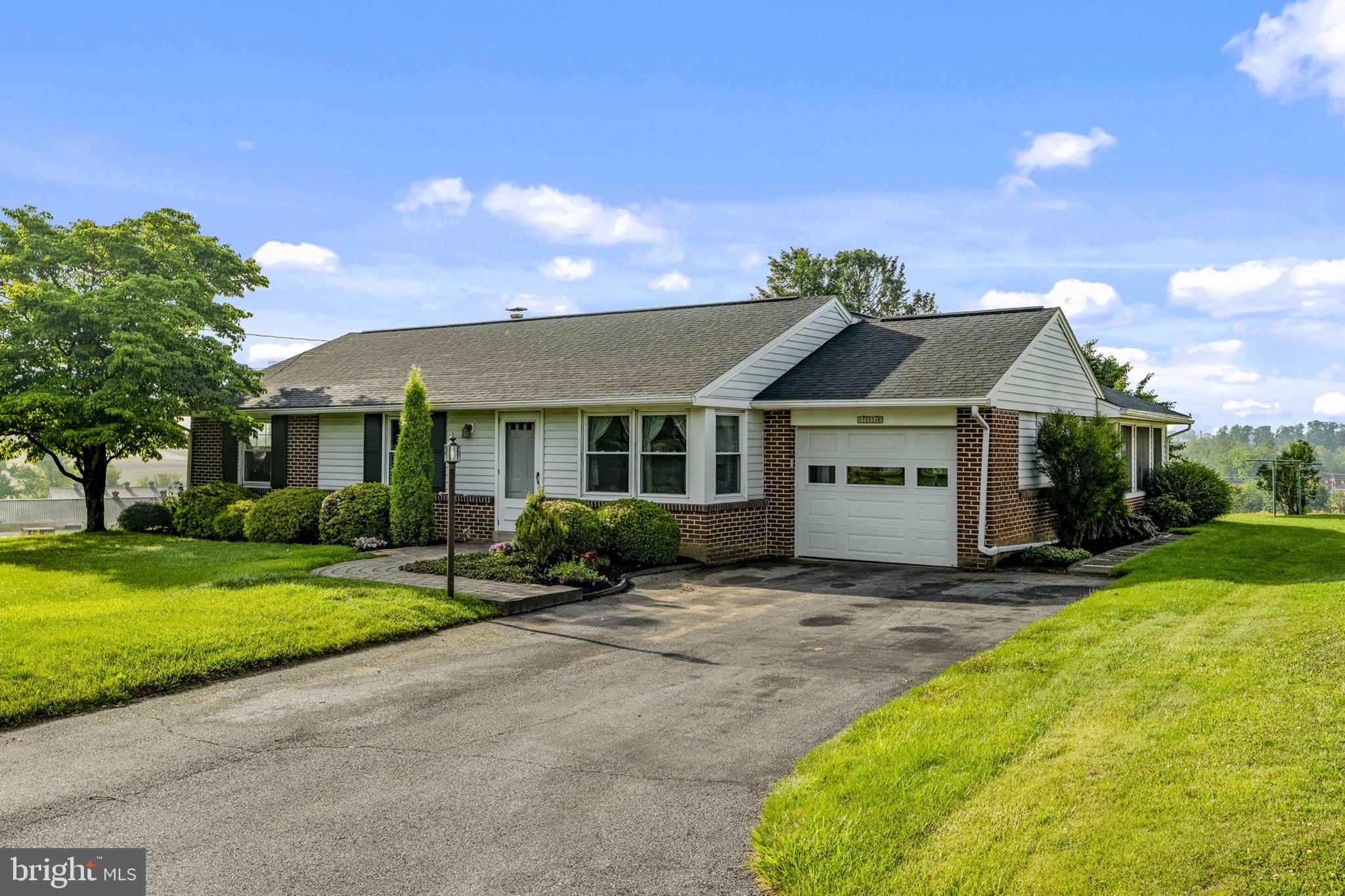 AUCTION DATE - FRIDAY, JULY 24, 2026, AT 4 PM. LISTED PRICE IS AN OPENING BID ONLY AND IS NOT INDICATIVE OF THE FINAL SALE PRICE. REAL ESTATE: 1 sty. brick/vinyl one-owner rancher w/2328 SF finished area, eat-in kitchen w/pantry & appliances, living rm., great rm. w/vaulted ceiling, brick hearth w/chimney flue & slide door to paver patio, 3 bdrms., full bath, laundry w/washer & dryer included, attic, full bsmt. w/rec. rm. & utility rm., oil forced air heat, central AC, beautiful hardwood flooring thru-out, low maintenance exterior w/covered soffit, fascia & insulated/tilt windows, attached 1-car garage w/overhead storage & utility bldg. 12x8 all on level .36 Acre country lot w/farmland boundary, professional landscaping, on-site well, public sewer & along a low-traffic road. NOTE: Been in the Brubaker family for 65 years! Ideally located, custom one-owner solid brick clean & well-maintained rancher. Great location, minutes to Lancaster, Smoketown & Bird In Hand. Easy access to Rts. 30, 340 & 222. Terms 10% down, balance 60 days or before. Personal inspection by appointment or open house Sat., July 11 & 18 from 1 to 4 PM.