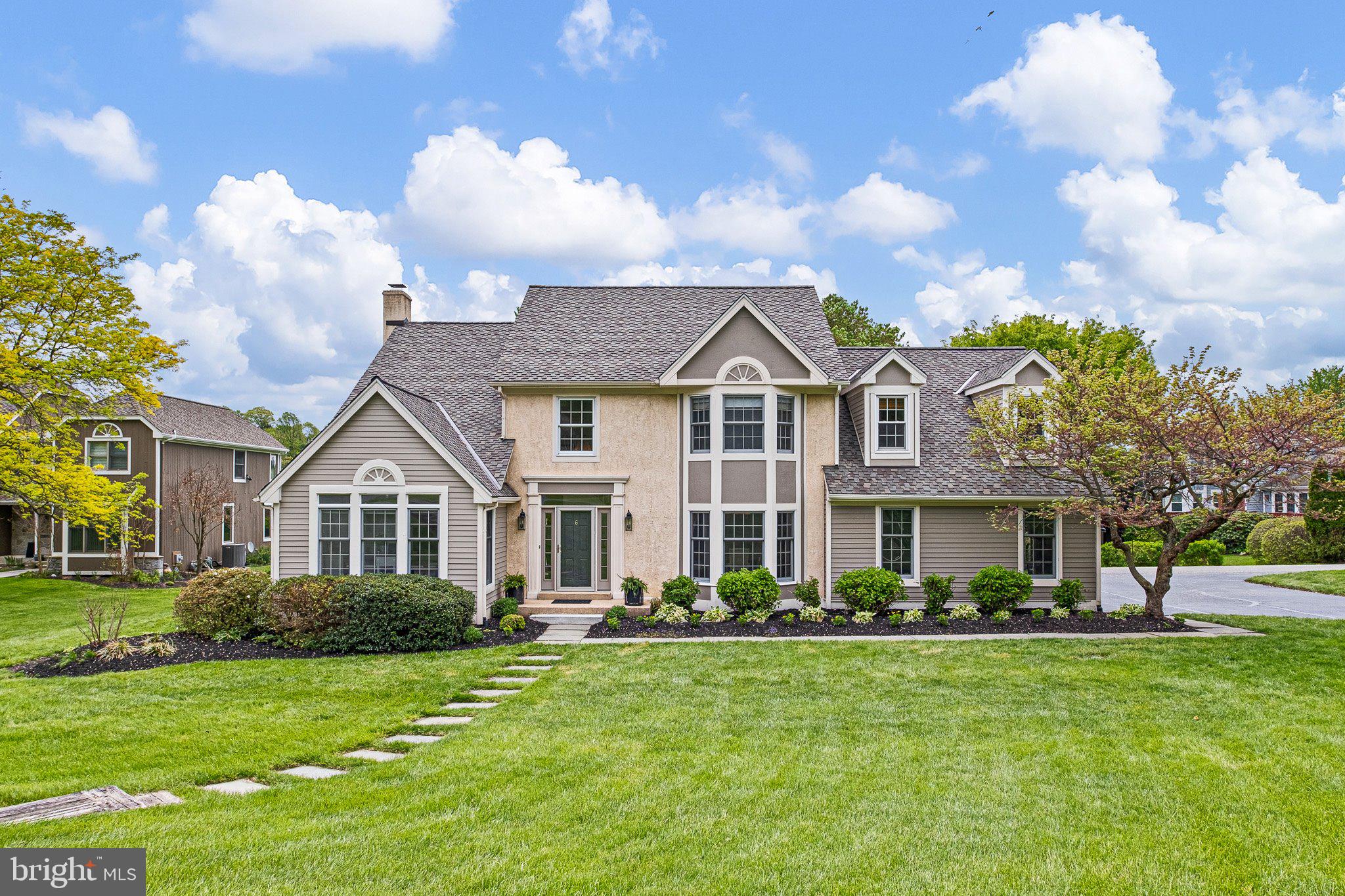 Experience one of the most coveted waterfront lifestyles in Chester County at the sought-after Landenberg community of Somerset Lake, an award-winning resort-style community centered around a spectacular 28-acre lake. Perfectly positioned on the water with breathtaking panoramic views from multiple rooms throughout the home, this exceptional lakefront residence offers a rare opportunity to enjoy sunrise reflections, peaceful waterfront sunsets, abundant wildlife, and even the occasional sighting of the community's resident bald eagle, all from the comfort of your own backyard. A private Trex dock extends directly into the lake, creating the perfect setting for kayaking, canoeing, fishing, paddleboarding, or simply unwinding while surrounded by nature. Beyond the property itself, Somerset Lake is renowned for offering a lifestyle that feels more like a private resort than a neighborhood, featuring Club Somerset with a swimming pool, pickleball courts, tennis courts, basketball courts, sand volleyball, fitness center, sauna, dog park, game room, bar lounge, walking trails, and an active year-round social calendar filled with events and activities that bring neighbors together. Beautifully maintained and extensively updated, this move-in-ready home combines timeless architecture with modern improvements and peace of mind. Major updates include a brand-new roof (2026), complete exterior repainting (2026), a stunning primary bathroom renovation (2024), fresh interior paint, and new carpeting throughout. Upon entering, guests are welcomed by a dramatic two-story foyer, rich hardwood flooring, and an abundance of natural light that draws your attention toward the stunning lake views beyond. The thoughtfully designed floor plan offers the ideal balance of open-concept living and defined spaces, including a formal dining room, spacious family room, private office with French glass doors, and expansive windows strategically positioned to capture the beauty of the water from many of the home's primary living areas. The impressive family room serves as the centerpiece of the home, showcasing uninterrupted lake views, custom built-in shelving, and a floor-to-ceiling stone fireplace with custom mantel. The updated kitchen is designed for both everyday living and entertaining, featuring quartz countertops, a center island, tile backsplash, standalone gas range, wall oven, abundant cabinetry, and generous workspace for preparing meals while enjoying views of the lake. Upstairs, the luxurious primary suite offers a private retreat complete with custom his-and-hers closets and a beautifully renovated spa-inspired bath completed in 2024. Three additional spacious bedrooms and a hall bath provide comfortable accommodations, while the finished lower level significantly expands the home's versatility with a recreation room, additional bedroom, and full bath ideal for guests, extended stays, fitness space, hobbies, or entertaining. Step outside onto the expansive deck and experience what makes this property truly special. Whether enjoying morning coffee overlooking the water, hosting summer gatherings, launching a kayak from your private dock, or ending the day with spectacular sunset views across the lake, every outdoor space has been designed to maximize the property's extraordinary setting. Conveniently located near Hockessin, Newark, Kennett Square, Wilmington, major commuting routes, shopping, dining, and healthcare, this exceptional Somerset Lake residence offers the rare combination of waterfront living, extensive updates, luxury amenities, and an unmatched community lifestyle. For those seeking a home that feels like a year-round vacation while remaining convenient to everything the region has to offer, opportunities like this are exceptionally rare.
