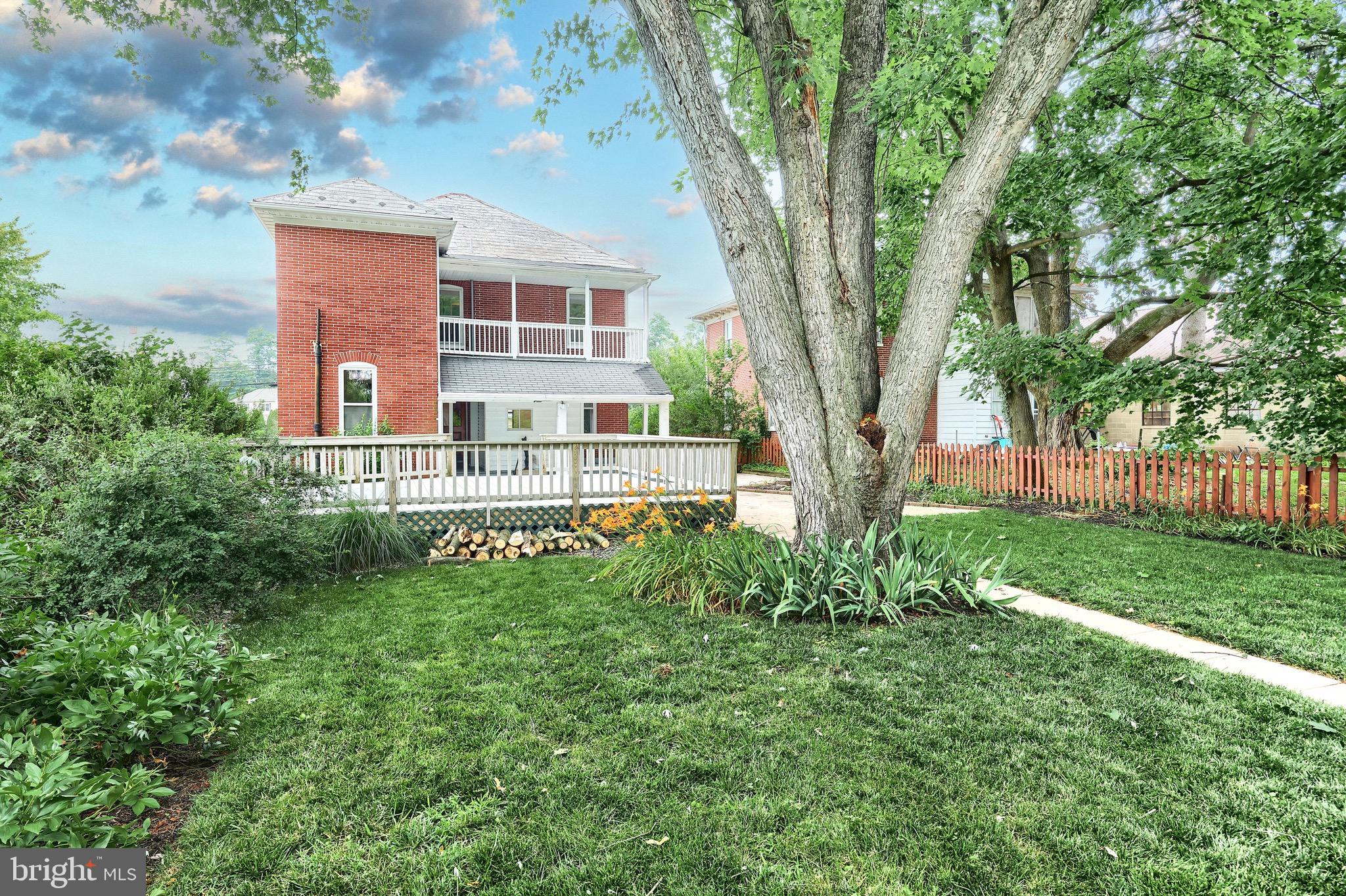 100% Financing available to qualified buyers! Stately  2 story brick home located is New Oxford.  Enjoy the beautiful wood work, open staircase, hardwood floors, & high ceilings.  First floor  features a cozy living room, den / first floor bedroom, full bath,  formal dining room, butler pantry, and galley kitchen.  2nd story offers 4/5 bedrooms, full bath, and a great balcony. Home offers 2 staircases, full attic with a dormer, full concrete basement, natural gas heat, central air, & 200 amp electrical service.  Fully fenced manicured back yard, with a deck, patio, and mature trees and established plantings.  Lot offers a garden shed and off street parking.  This is a traditional brick beauty and a must see!  Great location! Located in the heart of the antique capital, and a short drive to schools, great eateries, and major shopping amenities.