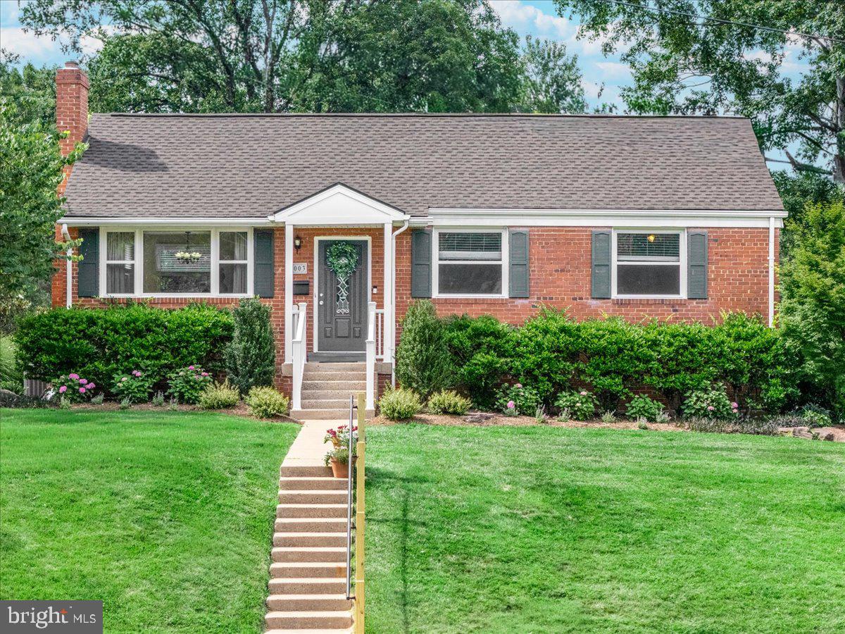OPEN SAT 6/27 12-2! Welcome to 7003 Terrace Court! Charming and beautifully updated, this 3-bedroom, 2-bath single-family all brick home, located on a cul-de-sac, offers the modern upgrades you desire while preserving the character and warmth that make it truly special! Gleaming refinished hardwood floors welcome you and flow throughout the main level. The spacious living room features a brick surround cozy fireplace and built-in shelving, seamlessly connecting to the designated dining area with built-in banquet seating.

The stunning renovated kitchen is the heart of the home, showcasing custom quartz countertops, designer backsplash, a 5-burner gas range, stainless steel appliances, and abundant pantry storage. Step outside to the expansive deck overlooking an extra large fenced backyard complete with two beautiful hardscape patios—perfect for entertaining, relaxing by the firepit, or enjoying movie nights under the stars on the deck with the outdoor TV!

The main level is completed by three generously sized bedrooms and a beautifully renovated full bath. Downstairs, the spacious lower level offers a large family room, second renovated full bath, laundry area, extensive storage space, and plenty of room to expand or customize to fit your needs.

Rarely do you find a home that combines a spacious park-like setting, thoughtful upgrades, and unmatched convenience just moments from dining, shopping, entertainment, and major commuter routes. Easy access to DC! This is the opportunity you've been waiting for. 7003 Terrace Court awaits - do not miss your opportunity to own this wonderfully maintained property!

*NEW ROOF MAY 2026*NEW BATHROOMS 2023*EXTENSIVE LANDSCAPING 2022*KITCHEN 2021*PATIOS 2021*HVAC & HWH 2020*WINDOWS 2017*SOME BASEMENT CARPET IS NEW 2026!