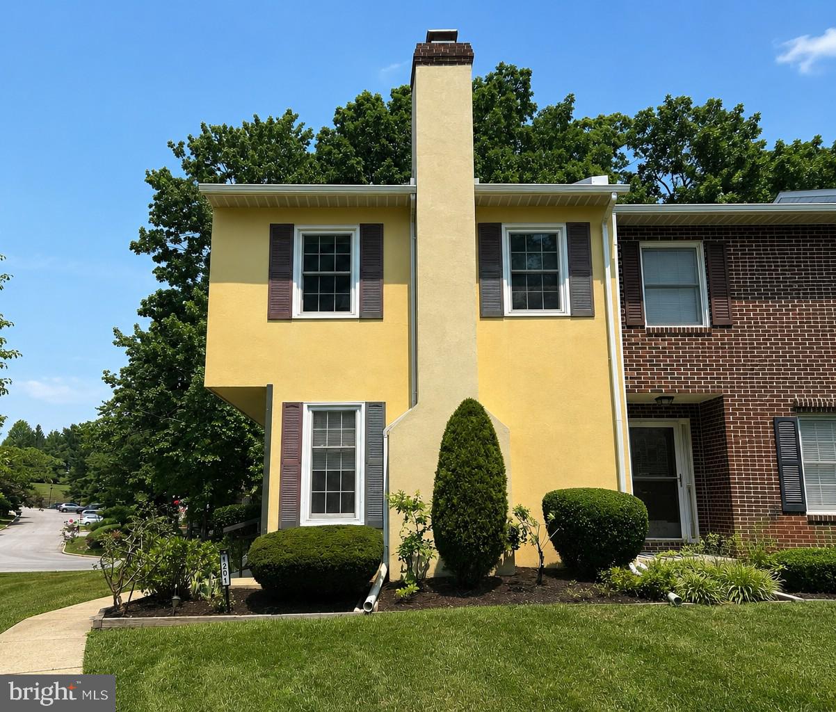 Welcome Home! 1201 Denise Circle is a charming end-unit,  stucco townhome in the desirable Covered Bridge Crossing community in East Pikeland Township. Offering 1,561 square feet of comfortable living space, this 2-bedroom, 1.5-bath home features a sunken living room with a dramatic,  brick fireplace  and plenty of natural light giving it a warm glow.  The fully-equipped kitchen opens onto a nice-sized dining area with plenty of room for a full-sized table and 6 chairs.  Sliding glass doors in the family room open onto  a large deck with a retractable awning—perfect for relaxing outdoors. This spacious layout is designed for everyday living, as well as gatherings of friends and family. Turned stairs lead up to the second floor with 2 full-sized bedrooms with plenty of closet space.  The full bathroom opens onto the hallway as well as the main bedroom.  The full basement includes a finished office, ideal for working from home, plus plenty of sturdy shelving for ample storage. Enjoy community amenities including tennis courts and a playground. Conveniently located near public transportation and just minutes from the vibrant shops, restaurants, and entertainment of eclectic downtown Phoenixville, with easy access to major commuter routes. Don't miss this wonderful opportunity to enjoy low-maintenance living in a fantastic location!  Call today!
Professional photos will be added by the weekend.