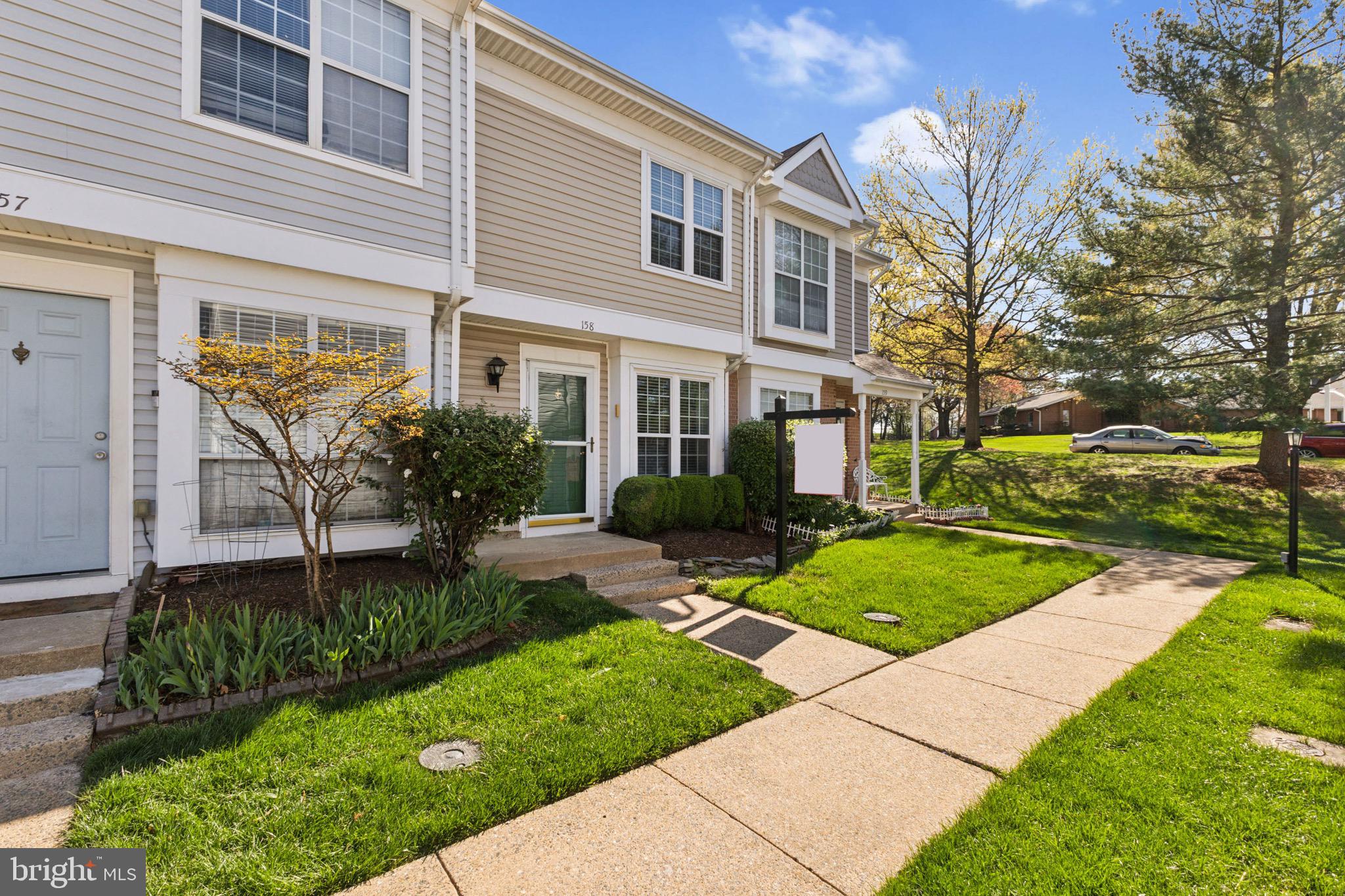 This fabulous two-level condo-style townhouse in Providence Village features two generously sized bedrooms and an updated full bath. The open and airy living and dining area boasts a charming box window, luxury vinyl floors, and elegant crown molding on the main level. The galley-style kitchen is equipped with stainless steel appliances, granite countertops, oak cabinetry, and leads out to a stone patio. Recent updates include bamboo flooring, a Newer HVAC system. Freshly Painted. Conveniently located near Dulles International Airport, the future Dulles Metro station, Route 28, and Route 7, this home offers easy access to major commuting routes. Leesburg Outlet and Tysons Corner Mall are also just a 30-minute drive away.