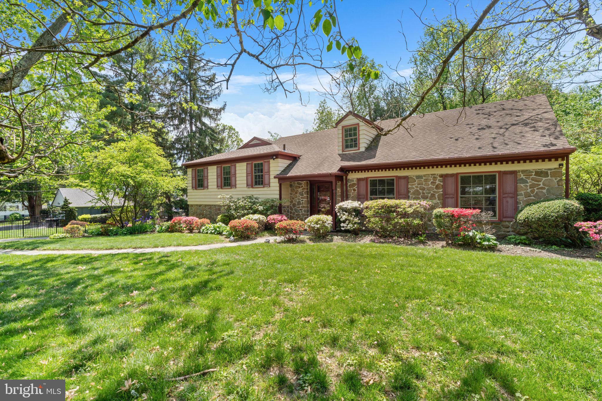 Welcome to 328 Tower Lane, a distinguished residence nestled in the serene enclave of Penn Valley in highly sought-after Lower Merion School District. This meticulously maintained split-level home blends classic charm with modern upgrades. Stretching across over 3,000 square feet, the home is set on an expansive nearly half-acre lot, providing ample space for both privacy, relaxation, and entertainment.

Upon entering, you'll be greeted by gorgeous marble tile in the foyer, along with gleaming hardwood floors in the living and dining rooms. The kitchen has been upgraded with quartz countertops, stainless steel appliances, recessed lighting, and has tons of natural light as well. Discover a thoughtfully designed interior featuring five spacious bedrooms and three and a half beautifully renovated bathrooms. The master suite is a true retreat, offering a California-style closet, and a luxurious spa-like bathroom complete with a soaking tub and rain shower—a perfect sanctuary for unwinding after a long day.

The home boasts a series of significant updates, including a newer roof, Andersen windows, and a state-of-the-art HVAC system with a dedicated zone for the third-floor master suite. The lower level introduces a skylit family room, filled with natural light from oversized windows and glass doors, leading out to a beautiful deck and patio.

The incredibly private backyard space is what takes this property to another level. The grounds have been meticulously cared for, and the entire lot is lined with mature tree growth for complete privacy -- a true oasis. This property offers a perfect blend of indoor elegance and outdoor leisure, making it an ideal setting for tranquil living and effortless entertaining. Being right across the street from Welsh Valley Middle School, and close to everything that Lower Merion has to offer, this one won't last long.
