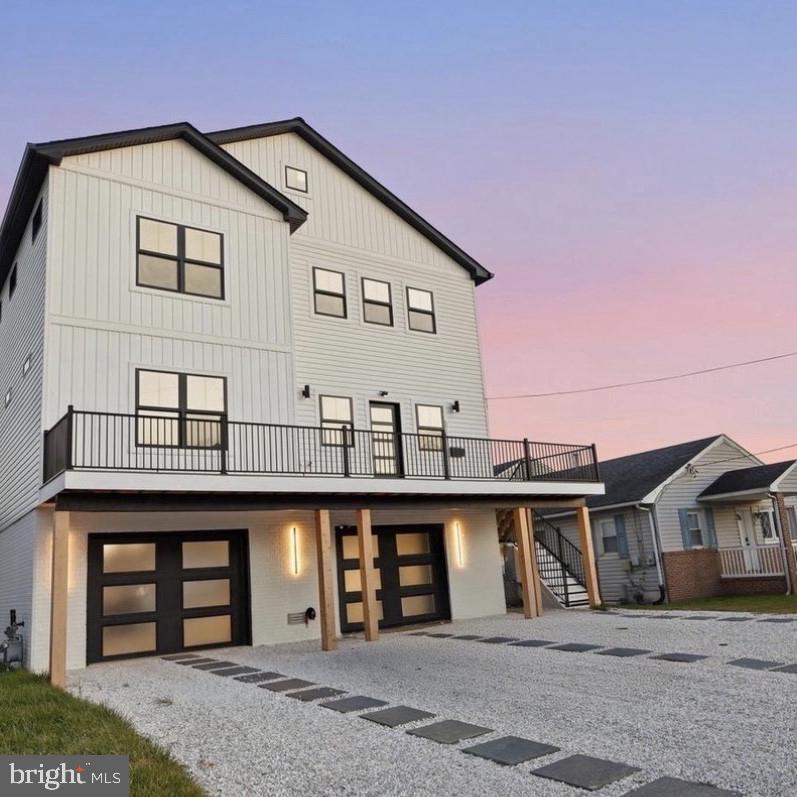 Welcome to 6931 River Drive Road, a stunning single-family home located in Sparrows Point, MD. Built in 2024, this modern home boasts a sleek and stylish design that is sure to impress. With 4 bedrooms, 4 bathrooms, and 1 half bathroom, there is plenty of space for the whole family to enjoy. The home features a spacious finished area of 3,000 sq.ft., providing ample room for living, dining, and entertaining. The open concept floor plan creates a seamless flow throughout the main living areas, making it perfect for hosting gatherings or simply relaxing with loved ones. Situated on a generous lot size of 16,482 sq.ft., this property offers plenty of outdoor space for enjoying the beautiful Maryland weather. Whether you're hosting a barbecue on the patio or playing catch in the expansive yard, there is no shortage of opportunities for outdoor fun. Inside, the home is filled with luxury finishes and modern amenities. The gourmet kitchen is a chef's dream, featuring high-end appliances, sleek countertops, and plenty of storage space. The bedrooms are spacious and bright, providing a peaceful retreat at the end of the day.*CUSTOM DESCRIPTION*Smart color lightning in kitchen and master bedroom. Dimmer lights in every room. Outside steps and rail night lights. Sonos smart speakers inside and outside home on each of the three party decks. Two wet bars with wine/drink mini fridges. Soft close cabinets draws and toilets. Three silent smart app garage doors and remote openers. Brand new smart Samsung washer and dryer. Located in Sparrows Point, MD, this home offers a quiet and peaceful setting while still being close to all the conveniences of city living. Enjoy easy access to shopping, dining, entertainment, and more, all within a short drive from your front door. Don't miss your chance to make this stunning property your new home. Make an offer today and experience the luxury and comfort of 6931 River Drive Road for yourself.