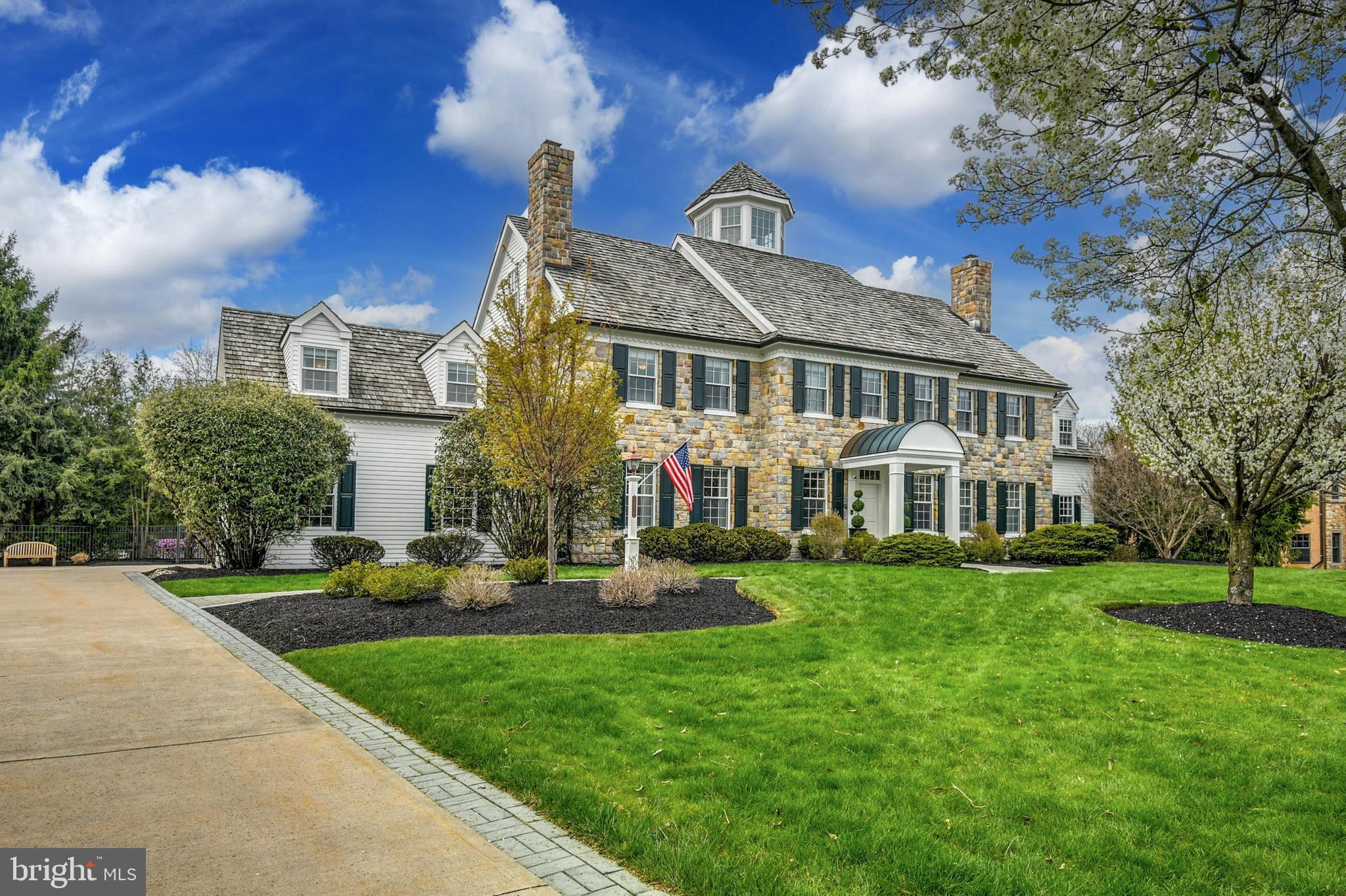 Welcoming…Gracious… Refined. Fairfield has many of the qualities of the perfect host and is a particularly fine example of a notable estate property. The timeless design, with modern interpretation, provides exceptional livability in a home with comfortable proportions. Fairfield is located on a quiet road with other stunning and noteworthy homes. Nestled quietly on its acreage, with a fabulous pool and custom landscaping, the property is bordered by Lindberg Park, where mature trees and open parkland are the picturesque backdrop. As the seasons change, autumn and winter are as stunning as spring and summer.
Inside, the amenities befit the house, and each turn reveals delightful architectural details in a warm and inviting ambiance. Every room is bathed in light, with a layout that provides an open floor plan and showcases richly laden and exemplary woodwork. Designed for grand or intimate gatherings, Fairfield has an architectural scale and custom embellishments that will take your breath away.  With an eye to flow and function, the first floor has ten foot ceilings. A bedroom suite, on the first floor, is perfect for guests and extended family.
A gourmet kitchen boasts every appliance required by a master chef, with a plethora of cabinets and stunning honed granite counters, opening to the family room and breakfast room, each with fireplaces. Multiple French doors open to an expansive screened porch, with fireplace, a bluestone patio, a custom pool and professional landscaping.
The second floor primary suite is an intimate retreat, offering a separate sitting area and fireplace, beverage bar, dressing room, a sumptuous master bath and a private office. On this floor, there are 4 additional bedrooms, each with a bath, and a 2nd family room with vaulted ceiling. Another staircase is a surprise ... it reaches for stars, rainbows and fireworks, taking you to the magic of a cupola with built-in seating for a 360 degree view.  
Finally, the lower level completes Fairfield’s 11,700 square feet. There is a game room, bar, rec room, billiards room and exercise room on this floor. A four car garage will allow everyone a parking space, or simply entice you to add a special collectable. Access to The Lehigh Parkway, a 629 acre park along the Little Lehigh River, is at the end of the block. The Lehigh Parkway is just beautiful … with many walking and running paths and loops.  

A house to live in, to entertain in, and to cherish, this classic colonial is a genteel blend of grace and subdued elegance, offering every detail befitting a home of this quality. There are few traditional home enthusiasts who have not dreamed of finding such a house, with such outstanding quality and condition, in an area renowned for its gracious properties. This utterly romantic home may be the best property you will ever see, effortlessly striking a remarkable balance between spaciousness and warm intimacy.