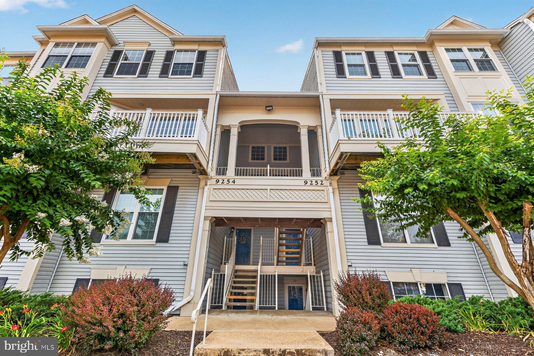 Move right in and start enjoying low maintenance living in this beautifully updated two level condo in the highly sought after Gunston Corner community of Lorton. Offering an open and inviting floor plan, an updated kitchen, a private balcony, two spacious bedrooms, and two and a half bathrooms, this home has everything you need.

The main level welcomes you with rich hardwood flooring that flows throughout the open living and dining areas. A cozy gas fireplace with a classic white mantel creates the perfect focal point, while oversized windows fill the space with natural light. Step outside to your private balcony, the perfect spot to enjoy your morning coffee or unwind after a long day. The kitchen is dynamite and features white cabinetry, granite countertops, and stainless steel appliances including a gas range, microwave, dishwasher, and refrigerator. It opens seamlessly to the dining area, making entertaining a breeze. A convenient powder room completes the main level.

Upstairs, retreat to the spacious primary bedroom featuring a soaring vaulted ceiling, ceiling fan, and a generous walk in closet. The second bedroom is bright and spacious with ample closet space. Both bedrooms share a well appointed bathroom with dual sinks and a tub and shower combination. A laundry closet with a washer and dryer adds everyday convenience.

Major updates provide peace of mind, including an HVAC system replaced in 2017 and a water heater replaced approximately two years ago.  The roof is maintained by the condo and was replaced in 2014. One assigned parking space and plenty of visitor parking.

Located within the sought after Laurel Hill Elementary, South County Middle, and South County High School pyramid, this home offers an exceptional location for both families and commuters.

The Gunston Corner HOA covers common area maintenance, lawn care, road maintenance, snow removal, and trash service. Residents also enjoy outstanding community amenities including a clubhouse, swimming pool, and beautifully maintained common areas.

Commuters will love the quick access to I-95 and the nearby Lorton VRE station, making travel into Washington, DC simple and convenient. Shopping, restaurants, parks, and outdoor recreation are all just minutes away.

With stylish updates, low maintenance living, fantastic community amenities, and an unbeatable location, this move in ready home checks every box. Some photos have been virtually staged. Schedule your private showing today before this one is gone!
