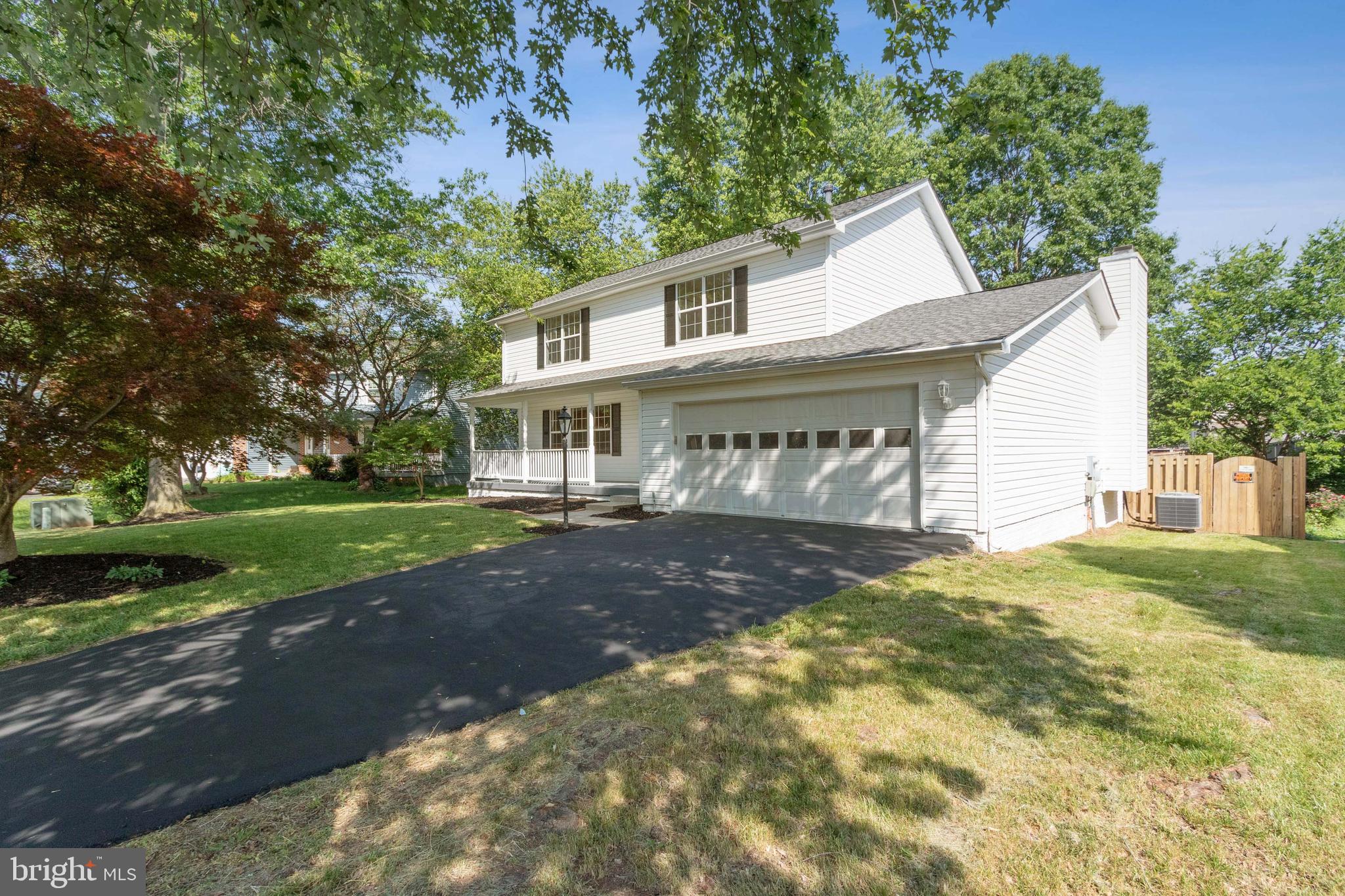 Welcome to this gorgeous SFH in a sought out community of Manassas.  The home has been recently remodeled with fresh paint, new lighting fixtures, new carpet, new bathrooms, and kitchen. As you enter the home, you are welcomed by the beautiful vinyl floors. The kitchen has new quartz countertops and new SS appliances. There's a separate dine-in, formal living, and a family room on the main floor. Upstairs, there are 4 bedrooms and 2 full bathrooms. The basement has another family room, newly remodeled bathroom, laundry room, and a lot space for storage in the utility room. The home offers a huge deck with a beautiful backyard. Geographically, the home is located close to all the shopping malls, minutes away from the old town Manassas, and only minutes away from VRE.
