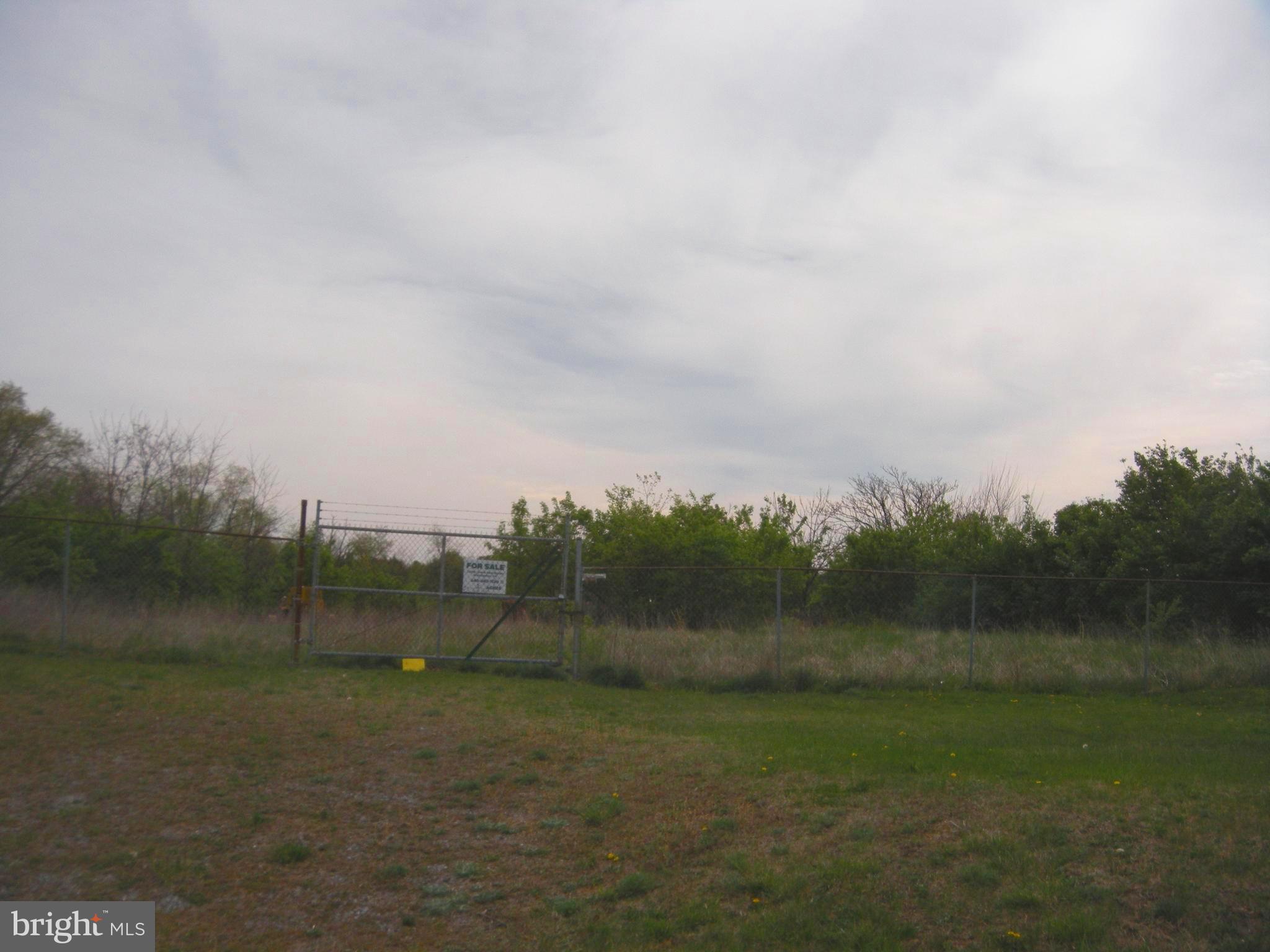 This is an acre of land in a great location, with approximately 100' frontage on Front Royal Pike (Rt.522S), near the Papermill Road intersection.  The land is fairly level, cleared (lots of underbrush needing to be cleared), fenced, has an old septic system on the property that may have potential to be updated.  An old well is on the property but not in use.  There may be access to Public Water at the front of the land.  No covenants or restrictions on the land, but with RA Zoning, you have restricted use.  Check Frederick County Planning/Zoning for Conditional Use, for this property. Buyer should use due diligence before placing offer.