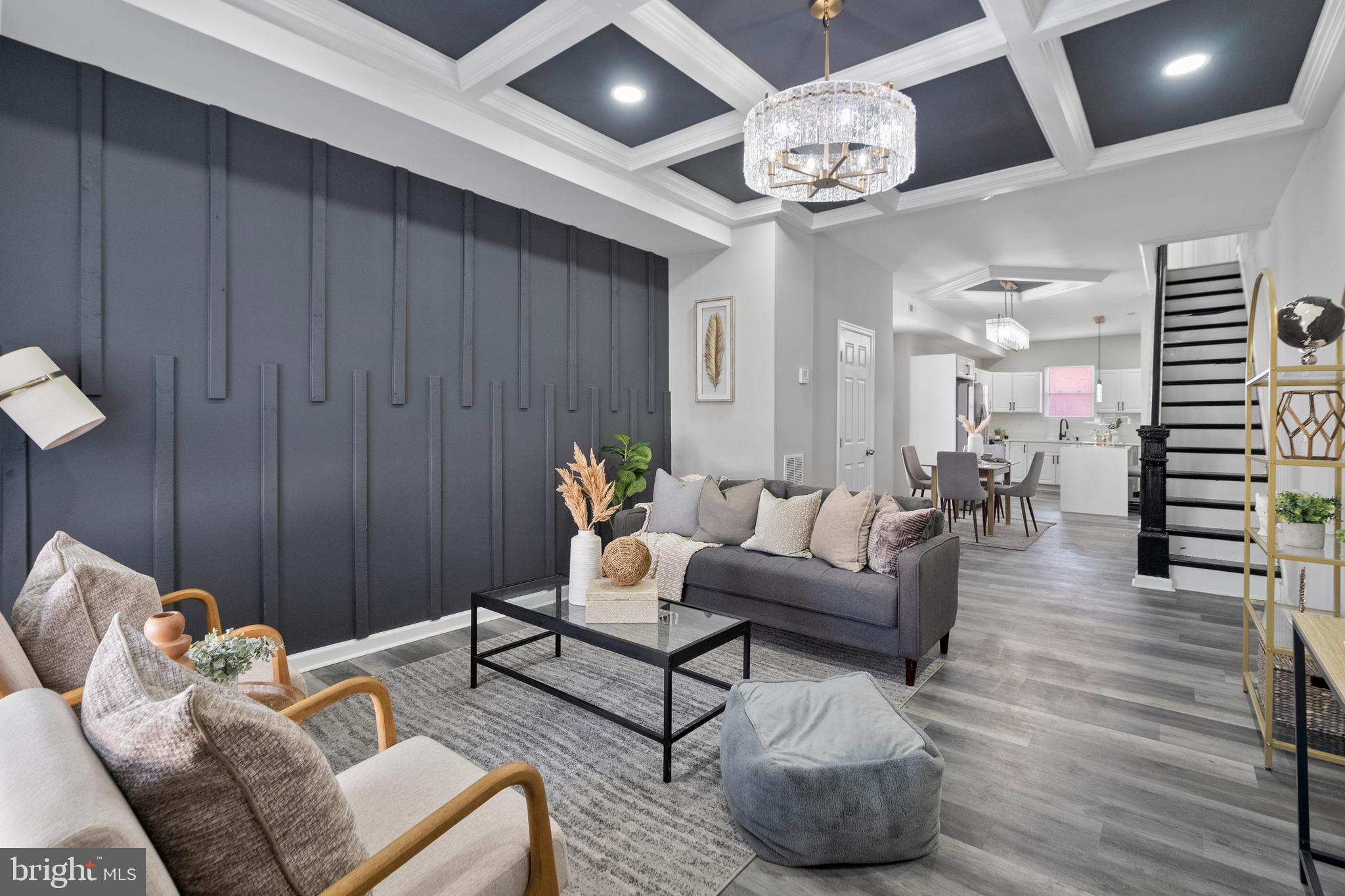 $17K Johns Hopkins LNYW Grant,$10K V2V Grant, $10K Project Reinvest, $10K LNYW Grant, $7500 (FHLB) Grant, $5K (CDBG) Grant. $8750 BorrowSmart Program. 3 levels of Luxury best describe this modern home w/ 3-bedroom, 3-bathroom, Trey Ceiling, Recess Lights, Custom Accent wall & High-end fixtures. New Electric, Plumbing, & HVAC w/ all approved permits, Including Use & Occupancy. The finished Basement, with a large entertainment space, & large fenced-in yard, which is great for hosting guests. The Chef kitchen features stainless steel appliances that include a 5 Burner Range, over-the-range microwave, Quartz Waterfall Countertops, & custom backsplash. This home is conveniently located close to Johns Hopkins University, Johns Hopkins Hospital, Clifton Park Golf Course, & fine restaurants while offering Luxury Living at Affordable Pricing! Upon completing Baltimore City homeownership counseling, you may be eligible for the following grants and down payment assistance programs listed above.