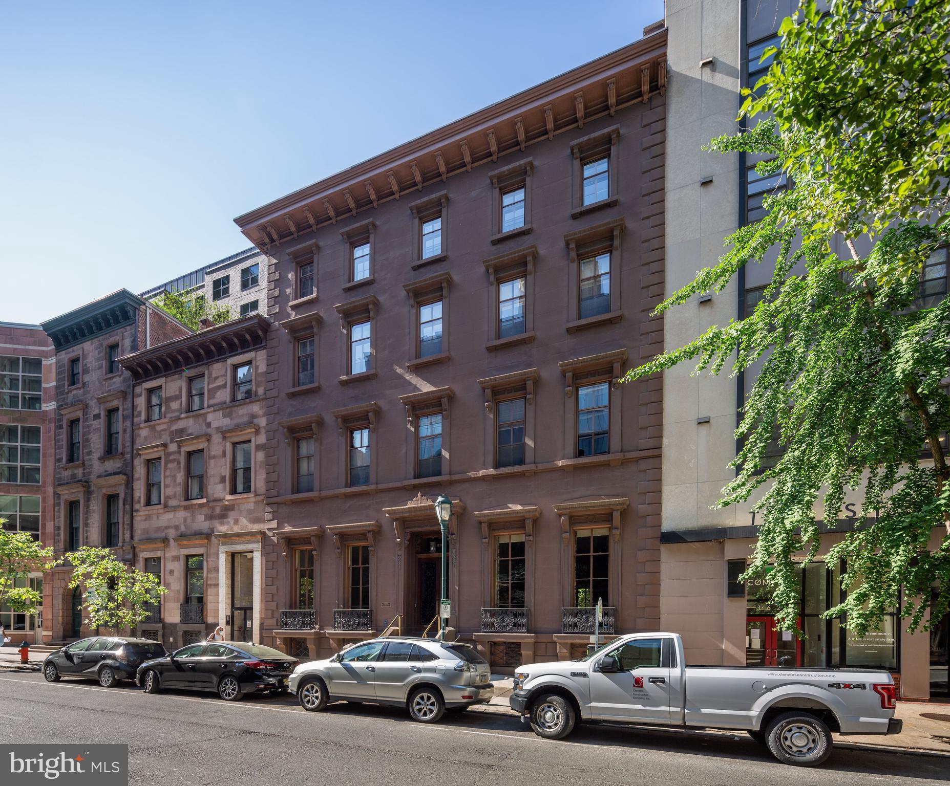 Welcome to 1622 Locust Street, a spectacular and prestigious double wide estate with an expansive rear courtyard situated one block form Rittenhouse Square on a charming, tree-lined block.  Constructed in 1852 as the Isaac Lea House, an elegant and stately private residence, the property has been used for commercial purposes for the last century, and for the last five decades has been owned and occupied by the same family as legal offices.  With the flexibility to be occupied commercially or through a residential conversion -- including the potential for by-right development of the courtyard -- the opportunity for investors, developers and commercial users alike to acquire this type of property truly only presents itself once in a lifetime! The building was designed by noted architect John Notman, who also designed the Athenaeum on Washington Square, as well as Saint Mark's Church directly across Locust Street.  It is one of the first examples in the United States of the Italianate villa style, a distinction which earned the property a Historic designation in Philadelphia in 1967.  The building boasts unparalleled original period detail beginning with the ground floor: an ornate vestibule, rooms with gracious proportions; high ceilings, full height windows and doors; crown molding, chair rail, wainscoting; arched and corbelled openings; marble fireplace mantels and inlay parquet floors. A grand central staircase with ornate, carved wood balustrades connects the building’s four stories, capped with a stained glass oval skylight.  In the rear of the property, accessible from a covered porch sits a large and pristine courtyard, lined with wrought iron railings and brick walls, paved with bluestone. Mature trees, manicured garden and a fountain create the feeling of a secluded urban oasis. The patio backs onto Latimer Street, providing additional light and air. Each floor of 1622 Locust overlooks beautiful and serene views to the north and south. A covered driveway for two cars is accessible from both the building and Latimer Street.