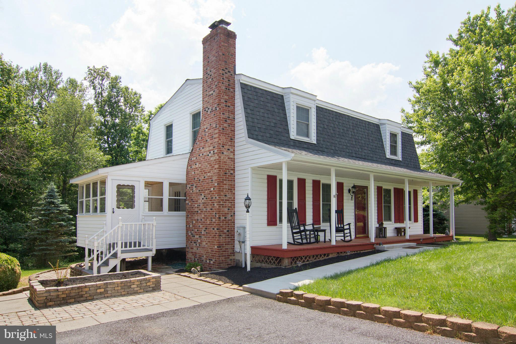 Price Reduction!  A rare opportunity! Much sought after community of Piney Run Estates has an opening! Peaceful Dutch Colonial on an acre with a charming front porch, expansive backyard- plus a bright sunroom!  Very large master bedroom!!  3 beds, 2.5 baths, eat in kitchen, dining room, living room, family room and fully finished basement.  You'll love the beauty Inside and out- a real charmer!