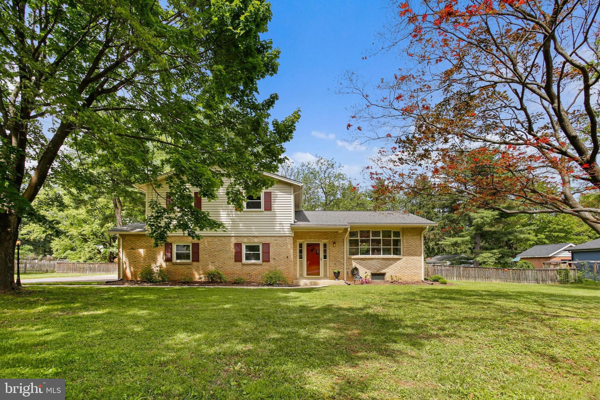 Welcome Home to 7006 Summerfield Drive, a gorgeous brick split-level home in sought-after Clover Hill!  With fresh paint, gleaming hardwood floors and updates galore, this one is a true show-stopper.  The home sits on a large .68 acre lot with mature trees and has a fully fenced backyard  with an expansive patio and large shed. The home's main level features a living room with a giant bay window facing the front yard, an updated kitchen with elegant granite counters and black Stainless Steel appliances, and a sunken family room with recessed lighting and a cozy wood-burning fireplace flanked by floor-to-ceiling built-ins.   The upper level features three large bedrooms, a master with private en suite,, and both full baths were just fully remodeled.  Other recent updates include new hot water heater (2025), new gutters with gutter-guards (2024), new windows and siding (2021), fenced backyard (2021), new variable speed HVAC and WiFi thermostat (2020), new roof (2019) and new asphalt driveway (2019).  The basement has space for rooms and features tons of built-in storage.  The home sits deep within Clover Hill on a quiet street with little traffic, yet is close to FCC, multiple walking paths and parks, and is just minutes to downtown.  All this plus no city taxes and a voluntary HOA (no HOA fees to pay unless you choose to join)  Hurry to see this one before it's gone!