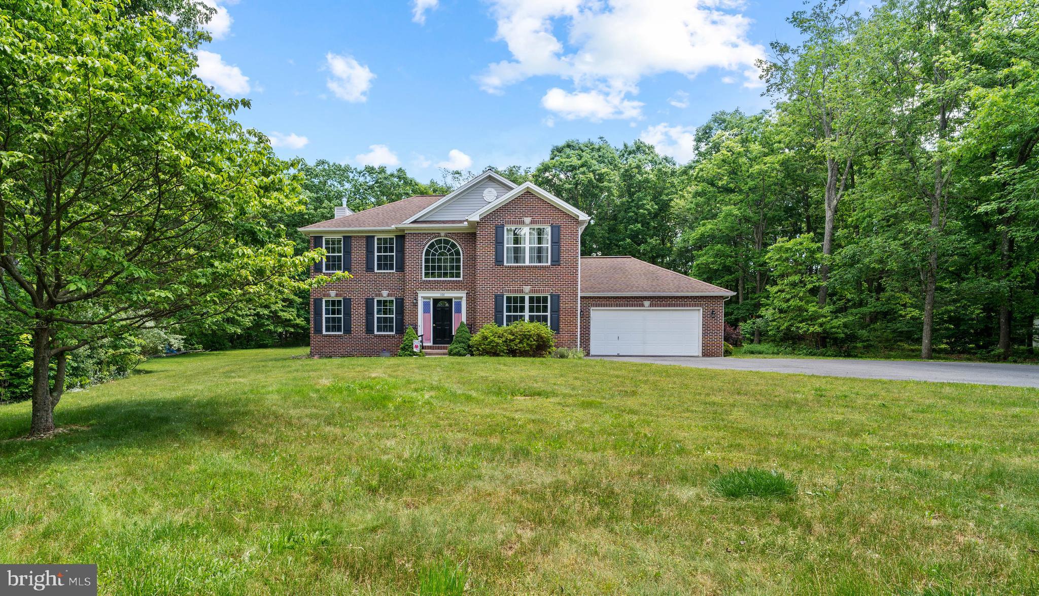 Welcome to this stately brick Colonial in the heart of Linnwood, offering 4 bedrooms, 3.5 baths, and timeless curb appeal on a private 1.23‑acre lot. Step inside the impressive two‑story foyer, where a soaring window and elegant chandelier fill the entry with natural light. The updated kitchen features granite countertops, black stainless appliances, and plenty of workspace for cooking and gathering. A cozy living room with a fireplace, a formal dining room, a first‑floor den, half bath, and laundry area complete the main level. Upstairs, the spacious owner’s suite offers a private full bath and a generous walk‑in closet. Three additional bedrooms and another full bath provide comfortable accommodations for family or guests. The basement is an entertainer’s dream — a true showstopper — boasting a wet bar, pool table, arcade area, theatre room, and a full bathroom, creating the perfect space for hosting game nights, movie marathons, or celebrations. Outside, enjoy peaceful views from the large back deck overlooking the expansive yard. An attached 2‑car garage adds everyday convenience. This home blends a classic Colonial style with modern amenities, offering space, wooded privacy, and unforgettable features both inside and out. 30 minutes from State college and 35 to Altoona. Basement items are negotiable.