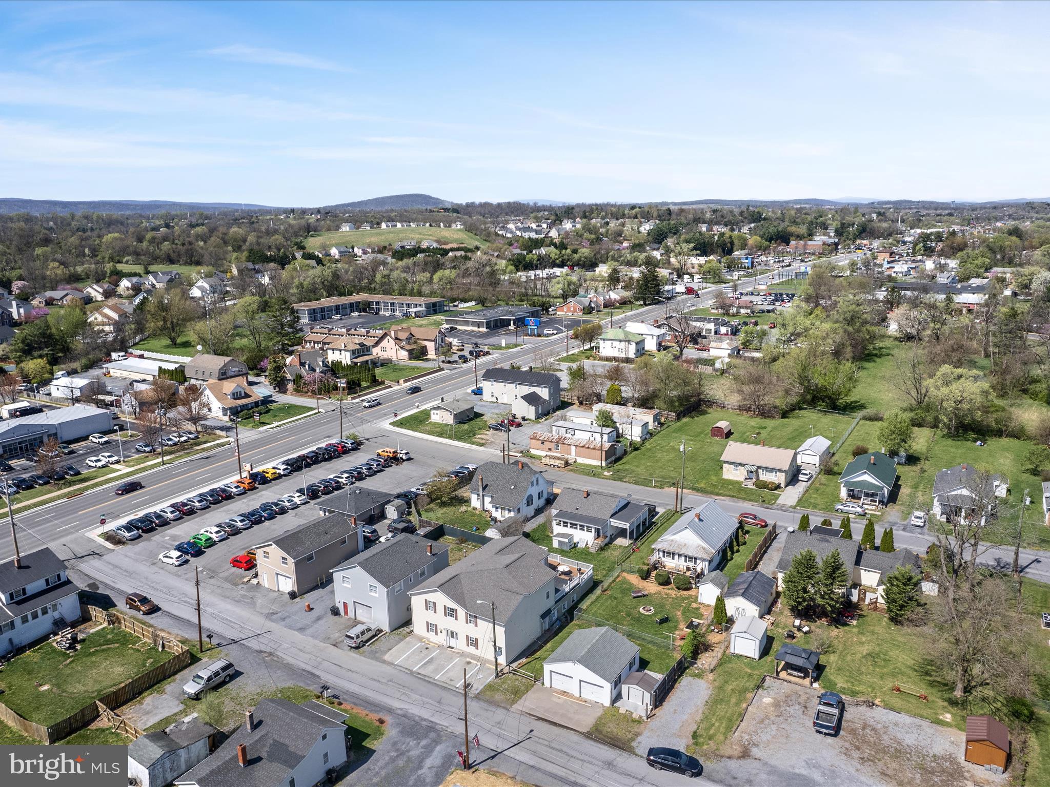 Welcome to 540 Monticello Street, a turnkey Multi-Unit Investment Opportunity in Prime Downtown Winchester Location!
Presenting a Triplex in the heart of Downtown Winchester—a rare opportunity for investors seeking strong cash flow in a highly desirable and commuter-friendly location. Just minutes from I-81 and I-66, and less than an hour from Northern Virginia, this property offers convenience, charm, and long-term value.

The building features two 2-Bedroom, 1-Bath Units – Each offers large Kitchens, updated finishes, and their own Laundry Rooms. One of the units is ground level, and the other 2nd-Level unit has access to its own deck space. The largest unit of the three features two finished levels, connected with an interior staircase, 5-Bedrooms, 2 Full Baths, 2 Living Rooms, a Full kitchen, Laundry, and access to it's own private patio & deck. It's a unique two-level layout, perfect for multi-tenants and/or premium rental rates.
Recent renovations throughout the last few years include:
Luxury vinyl plank (LVP) flooring, fresh paint, and updated kitchens and baths
Newer appliances in each unit
The roof less than 3 years old
New HVAC installed (2025)
Designated parking for all units
With all units currently leased, this is a true turnkey investment with reliable income and minimal immediate maintenance needs. This well-maintained building features three fully occupied units, bringing in a current gross annual rental income of $45,300. 
Whether you're looking to grow your portfolio or occupy a unit while renting the others, or the potential for a short-term rental, this property checks all the boxes!