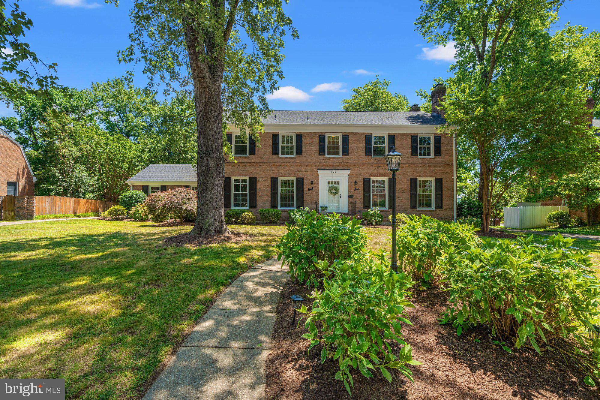 Welcome to 824 Emerald Drive.... a truly special opportunity to own a one-of-a-kind, meticulously maintained home on what has come to be known as the "Gold Coast" of Waynewood.  The Gold Coast is a small portion of Emerald Drive that backs to the GW Parkway and the Potomac River.  It is a lovely little nook in this beloved neighborhood with pristinely maintained homes each with a distinct charm and personality.  824 Emerald is a stately center hall colonial that is expansive both inside and out!  It has delightful views of the Potomac River through the mature trees on and off the property and is positioned beautifully on the lot with a seemingly endless backyard that feels so happy and comfortable.  The exquisite curb appeal is noteworthy but not unusual as each property that surrounds this home is pristinely cared for adding to the magical charm of this lovely spot. Upon entering the home, you immediately see the fastidious attention to detail from the copious amounts of molding and trim work to special touches that enhance the unmatched appeal of this property. The house flows pleasantly from room to room and floor to floor. On the main level, there is a formal living area w/ a fireplace, dining room, gourmet kitchen with a side-by-side Subzero refrigerator and freezer, family room w/ another fireplace, a large sunroom w/ wraparound windows, and a full bathroom. On the upper level, there are five sizable bedrooms, including a primary suite with a large primary bathroom and multiple closets, two full bathrooms and access to an upper-level deck. The lower level has a comfortable and cozy basement family room with a built-in bar, an additional room which would be perfect for an office or workout space and a full bathroom with a sauna. There are walk-up stairs to the sprawling yard from the basement as well.  2 car side loading garage. Extraordinary opportunity to own an exceptional property in this special community!  A must see!  Did I mention GOLD COAST?  Fun fact- this home was owned by former Washington Redskins player, Sam Huff!  If these walls could talk...... !