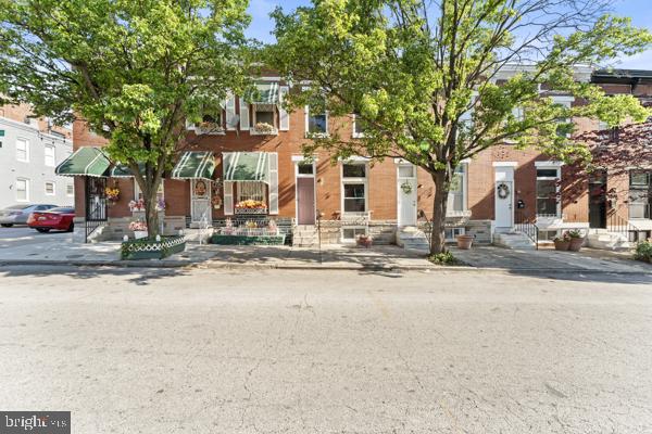 Welcome to 2528 Ashland Ave – where historic charm meets modern comfort! This beautifully updated 3-bedroom, 3.5-bath rooms, the home boasts Step inside to discover an inviting open-concept main level featuring gleaming hardwood floors, high ceilings, recessed lighting, and a seamless layout perfect for entertaining. The gourmet kitchen is a chef’s dream with quartz countertops, tiled backsplash, stainless steel appliances including wine cooler . Upstairs, you’ll find two generously sized primary suites, each with its own private ensuite bath, plus hardwood flooring and modern finishes throughout. The fully finished lower level offers even more living space, complete with a cozy family room, laundry area, a third bedroom with wall out door and a full bath—ideal for guests, roommates, or a home office. Out back, enjoy a private fenced that doubles as an outdoor entertaining area Located just minutes from The Johns Hopkins Hospital and steps to the green spaces of Patterson Park, this home is also conveniently close to Canton, Fells Point, Harbor East, Little Italy, and Downtown Baltimore, offering endless dining, shopping, and entertainment options. Don’t miss your chance to own this stunning home with unbeatable charm, location, and value!