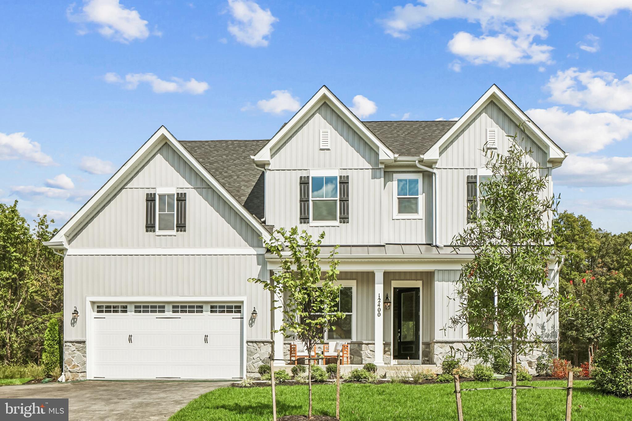 Presenting the Annapolis Builder Model at Summergreen Estates, available now. This beautifully crafted Annapolis floorplan offers an open-concept layout, upscale finishes, and timeless craftsmanship throughout.

The inviting Craftsman-style exterior and spacious two-car front-load garage welcome you. Inside, 10-foot ceilings and 8-foot doors on the main level create a bright, open atmosphere ideal for everyday living.

Highlights include a great room with coffered ceiling and electric fireplace, extended morning room and screened porch, and a gourmet kitchen with expansive island, upgraded cabinetry, quartz countertops, farmhouse sink, stainless steel appliances, and a butler’s pantry with glass-door cabinetry and wine storage. The luxurious primary suite features a California-style spa bath with quartz countertops and elegant finishes. Tray ceilings in the primary suite and dining room, wood shelving, cased windows, and craftsman-style railings add sophistication throughout.

The finished lower level provides additional living space with 9-foot ceilings, a recreation room, media room with raised theater platforms, private den with egress window, and a full bath. 

Set on a wooded homesite in Summergreen Estates, this home offers privacy and convenience close to major routes, shopping, and dining, with no HOA fees. Backed by the Caruso Homes builder warranty, the Annapolis delivers comfort, quality, and peace of mind.