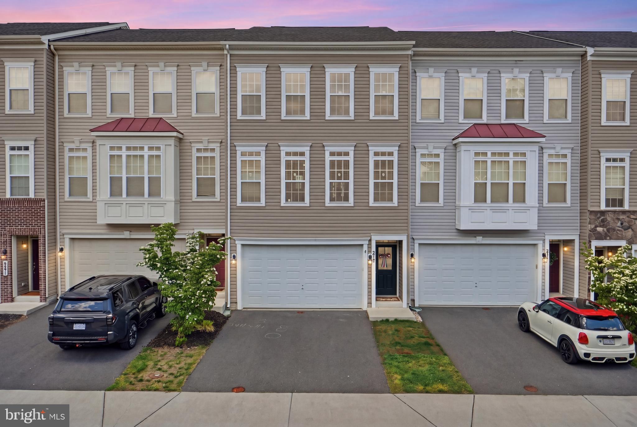 OPEN HOUSE:
SATURDAY JUNE 13th 3-5PM
SUNDAY JUNE 14th 1-4PM

Beautiful, bright, and sun-filled home featuring the largest floor plan in the community with over 2,600 square feet of thoughtfully designed living space. This exceptional home showcases numerous quality builder upgrades throughout, including all wood and luxury vinyl plank flooring (no carpet anywhere), upgraded kitchen appliance package, quartz countertops, enhanced cabinetry, designer lighting, upgraded ceramic tile, luxurious primary bath finishes, and elegant Craftsman-style trim, doors, and moldings.

Recent improvements include a brand-new deck, new dishwasher, and new washer and dryer, providing both style and convenience for the next owner. The fully finished lower level offers a private en-suite bedroom, perfect for guests, multigenerational living, or a home office. An oversized garage provides ample storage and parking space.

Move-in ready and meticulously maintained, this home combines modern upgrades, functional living spaces, and abundant natural light throughout. Please remove shoes when touring the home.