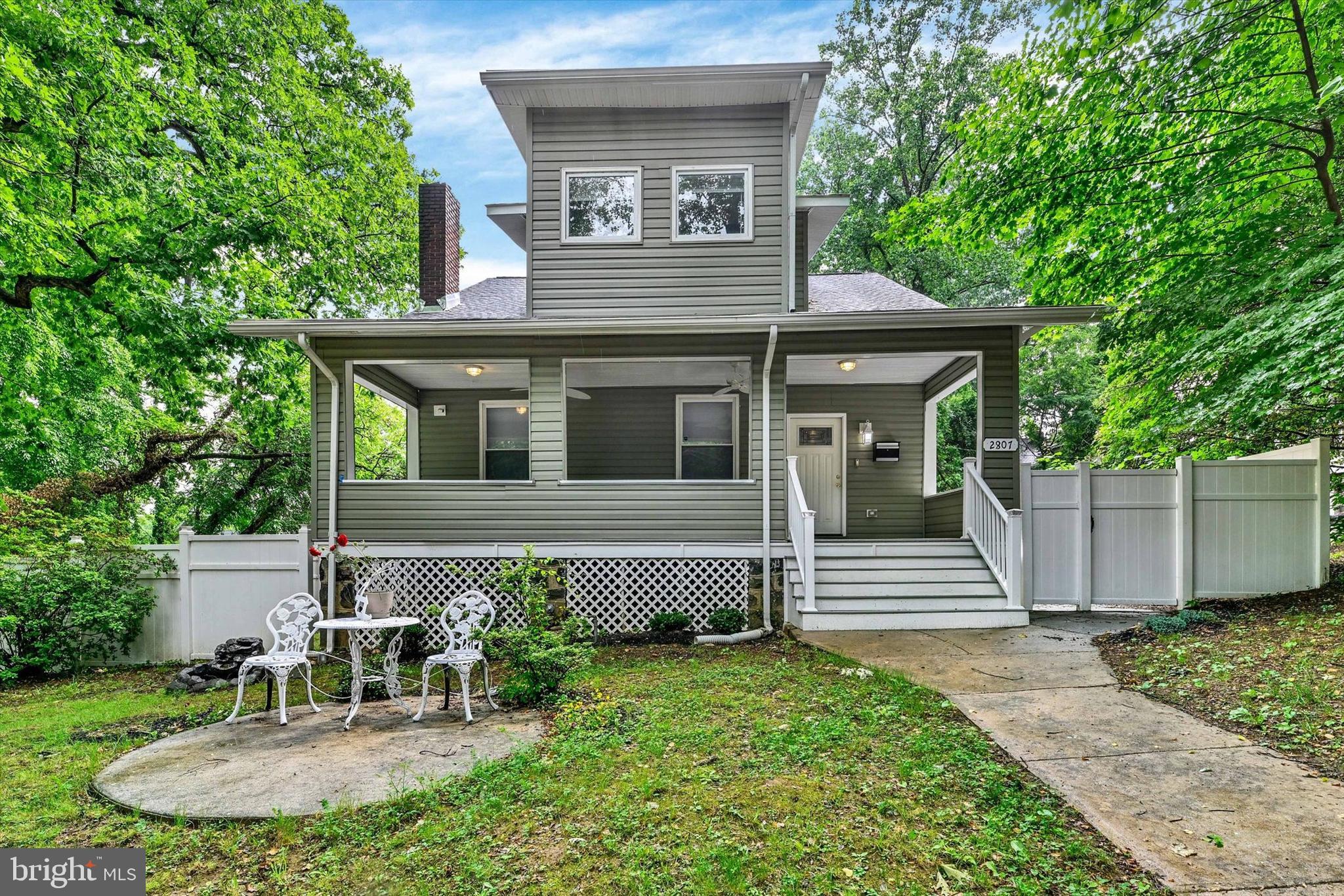 Welcome to 2807 Lawina Road, a spacious and thoughtfully designed single-family home offering three finished levels of living space and a versatile floor plan perfect for a variety of lifestyles.

The main level features a welcoming living room with a cozy fireplace, a convenient powder room, and a full-service kitchen equipped with stainless steel appliances, a center island with built-in cabinetry, and ample workspace. Adjacent to the kitchen are a bright breakfast area and a formal dining room, creating the perfect setting for both everyday living and entertaining. This level also includes a main-level bedroom with an attached full bathroom, ideal for guests or multigenerational living.

Upstairs, you'll find three generously sized secondary bedrooms, a full hall bathroom, and an impressive primary suite filled with natural light. The primary retreat boasts two walk-in closets and a luxurious en-suite bathroom featuring a soaking tub, walk-in shower, and private water closet.

The fully finished lower level provides exceptional additional living space with a large recreation room, laundry hookups with utility sink, a half bathroom, and two additional bedrooms—each complete with its own attached full bathroom, offering privacy and flexibility for guests, extended family, or home office needs.

Outside, enjoy the charm of the large front porch and the convenience of a fenced rear yard that extends to include the side yards, providing plenty of outdoor space for entertaining, pets, or play. Additional features include a storage shed and a private one-car driveway.

With its expansive layout, multiple bedroom suites, and abundance of indoor and outdoor living space, this home offers comfort, functionality, and endless possibilities.