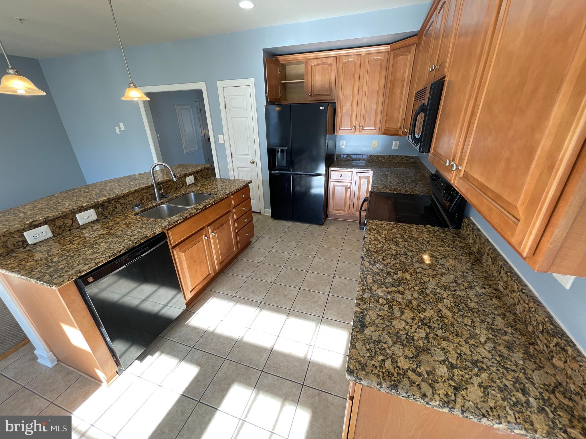 1st Month FREE with a 12 month lease.

Stunning 2 level condo.  This place is perfect for you!  Carpets freshly cleaned and a new paint job, this place shines!  The main level offers a huge living and dining space with a half bath, as you pass into the kitchen there is a large family room and kitchen to die for!  Granite, stainless, island and tons of storage space!  Upstairs offers 3 bedrooms, 2 full bathrooms and a big laundry room with storage.  The master suite is enormous with 2 walk in closets and a 4 piece bathroom.   1 car rear load garage in the back of the building that walks right into your home. 

To Qualify: Household income of $125k+, minimum credit scores of 640, no pets, no smokers.  Ask agent for application.