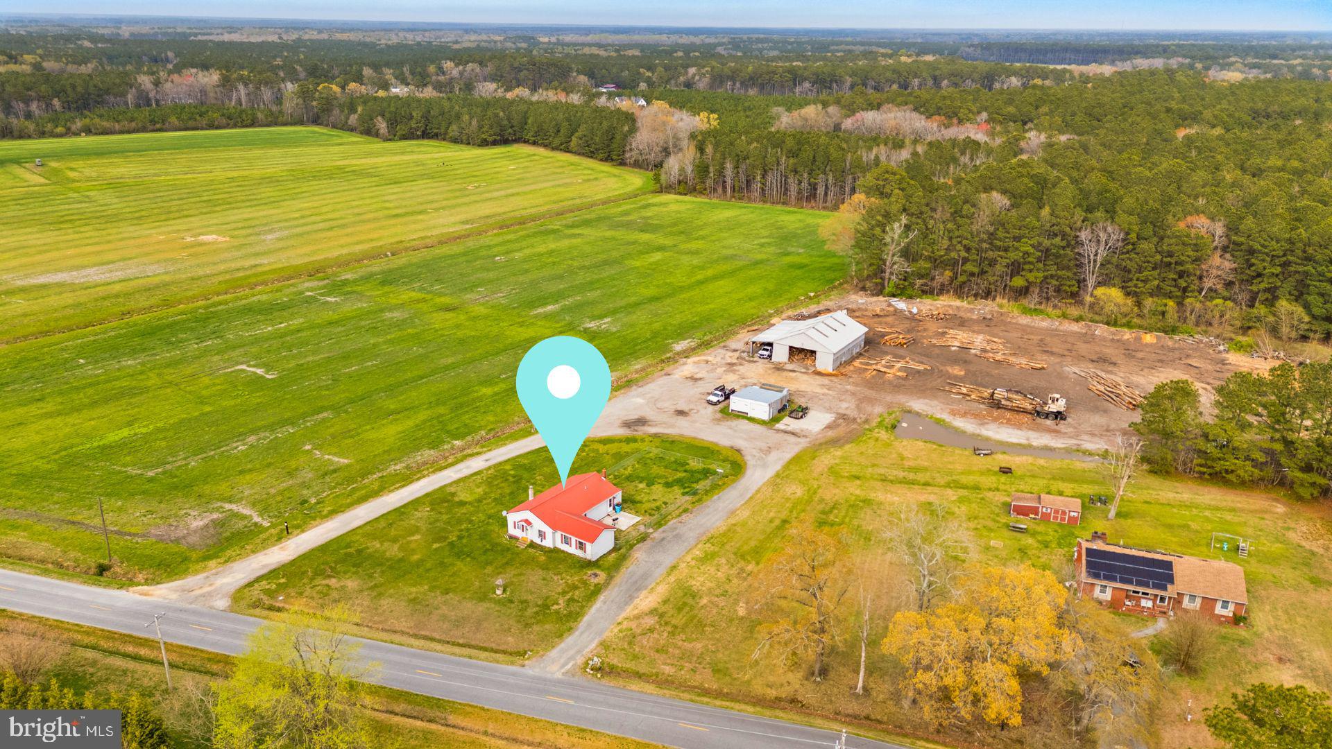 Some properties are about the house...
This one is about what you can do with the Land!

Set on 4+ mostly cleared acres along Buck Harbor Road in Worcester County, this property offers the kind of space and flexibility that is getting harder to find. Zoned Ag-1, it opens the door to a range of possibilities, from a private homestead to horses, small-scale farming, or simply having room to spread out without feeling confined.

The existing home is a 3 bedroom, 2 bath rancher offering approximately 1,300+ square feet. It has central air, a metal roof, and a functional layout, but it will require updates and improvements. For the right buyer, that is where the opportunity begins.

This is not about perfection. It is about potential.

The real value shows up the moment you step Outside.

A 24x24 detached garage and a 40x60 pole barn are already in place, giving you immediate utility for equipment, vehicles, hobbies, or workspace. Whether you are running a small operation, storing recreational gear, or building out a long-term vision for the property, the infrastructure is already here.

The land itself is mostly cleared, making it usable from day one. No heavy clearing costs. Just open space ready for your plans.

Location matters too. You are just minutes from downtown Pocomoke City for everyday needs, while still enjoying the privacy and flexibility that come with a larger Worcester County parcel.

For buyers looking for a finished, fully updated home, this may not be the right fit.

For buyers who understand the long-term value of land, zoning flexibility, and usable acreage, this is where things start to make sense.

The property is tenant occupied on a month-to-month lease and is being sold as-is. All inspections are for informational purposes.

If you have been searching for space, flexibility, and the ability to create something over time, this is worth your attention.