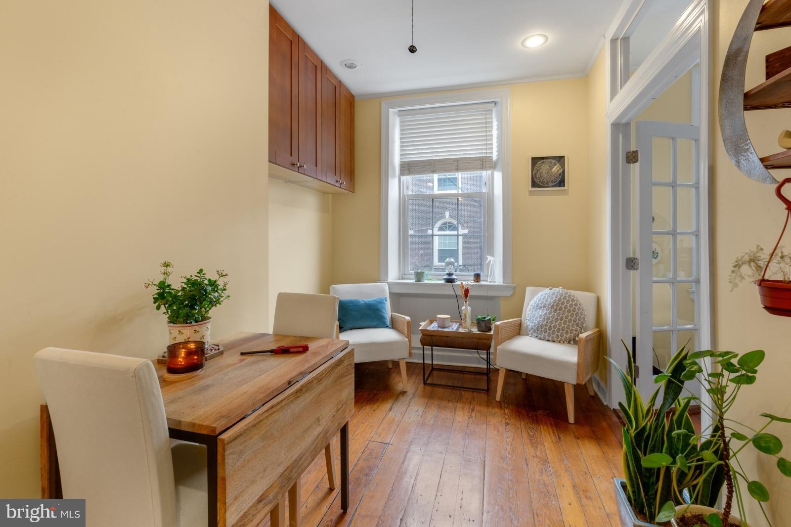 Welcome to 1341 Lombard St #2! This stylish 1-bedroom, 1-bathroom second-floor condo is perfectly situated just off Broad Street in the Washington Square West neighborhood. Featuring hardwood floors, abundant natural light, and thoughtful modern updates, this home offers both comfort and functionality.

The kitchen is equipped with shaker-style cabinetry, black granite countertops, and stainless steel appliances. The bathroom showcases a marble-topped vanity, floating vessel sink, and a full tub with sliding glass doors. Custom cabinetry runs along the length of the unit, providing excellent storage and ending in a cozy office nook by the front window. Glass-paneled French doors lead into the bright bedroom, complete with a closet and ceiling fan. Additional highlights include a private storage area that house the washer and dryer unit, located in the building’s lower level, exclusively for this unit. The fenced in back patio it shared by the units in the building.
Enjoy a prime location near the Avenue of the Arts, with convenient access to a variety of dining, entertainment, and cultural destinations.
Short term rentals are not permitted with the HOA. Minimum 1 year lease length.