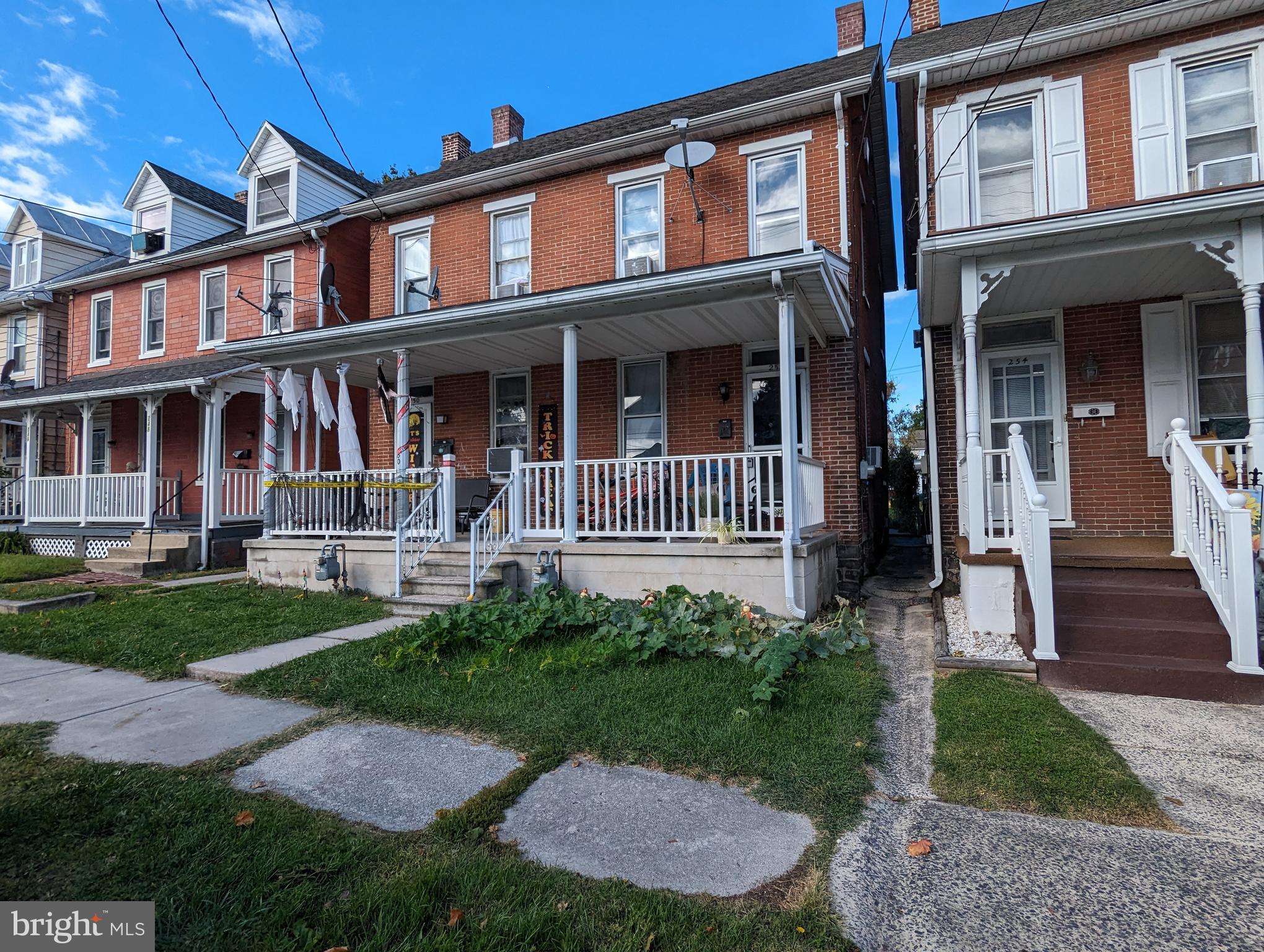 Excellent location for this brick duplex which includes two residential rental units and 3 storage units. Just a few blocks from Baltimore St and close to Rt 15 for commuting. Walk to battlefield and Lincoln Elementary and GAMS. Each side has 3 BRs, 1 BA. Each currently rented for $1300 monthly, tenants pay all utilities.
Residential parking permits provide on street parking. There are three garage units in the rear which are also rented for $75 monthly. Tenants can not park in the rear as it would block the garage access.
R2 Zoning info included in the docs. Vacation rentals are not permitted..
